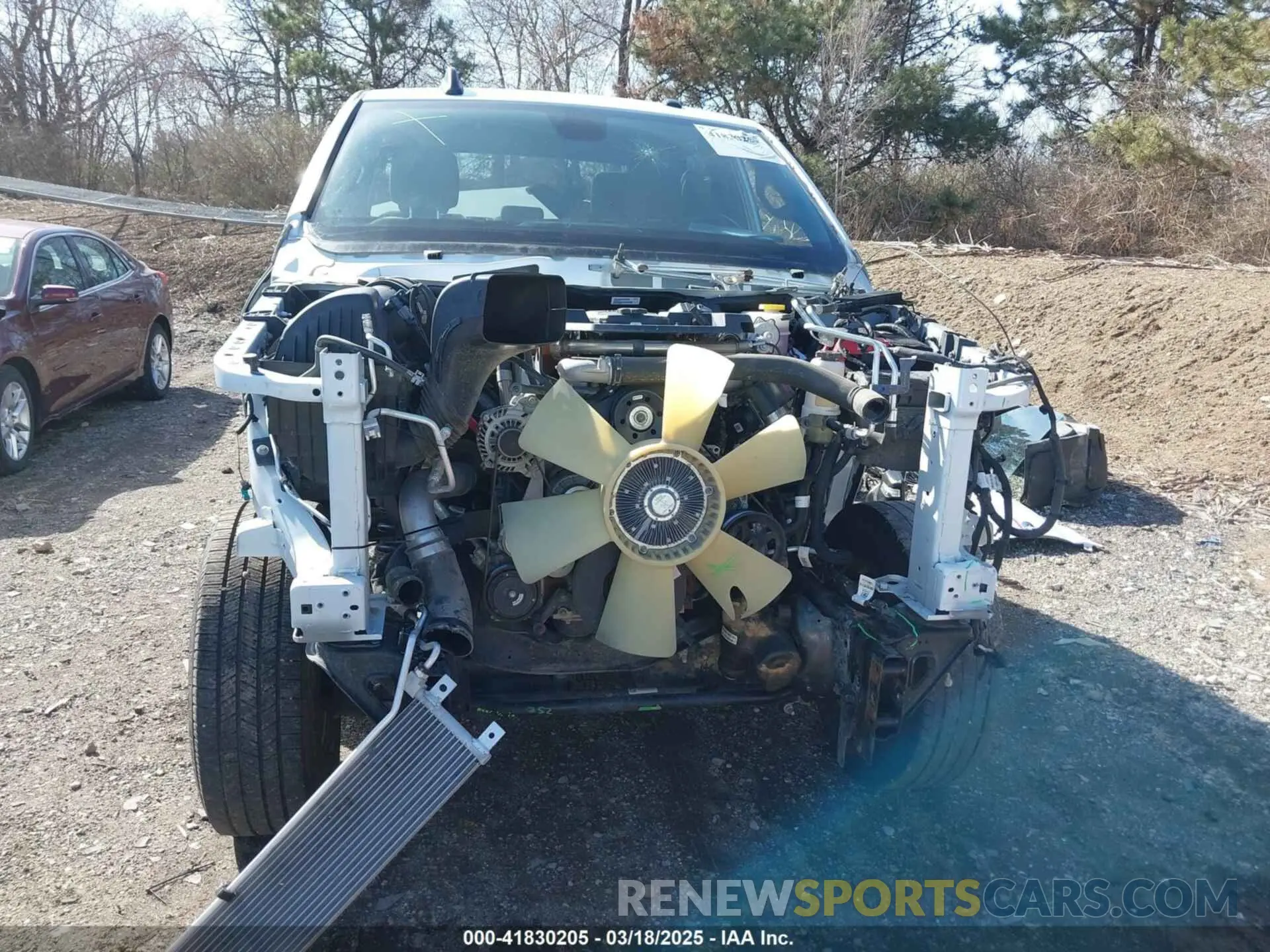 13 Photograph of a damaged car 3C6UR5DL0PG611149 RAM 2500 2023