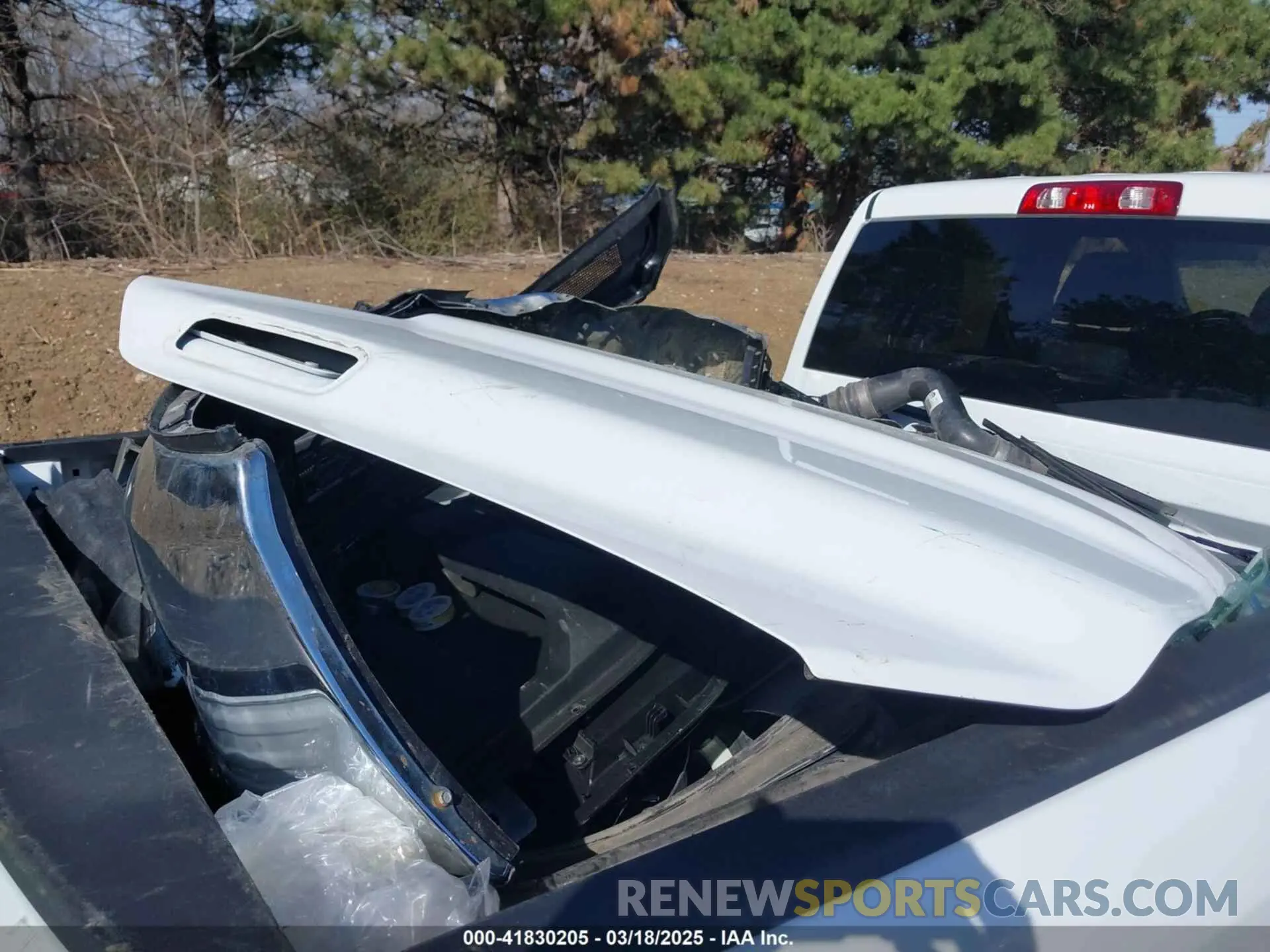 19 Photograph of a damaged car 3C6UR5DL0PG611149 RAM 2500 2023