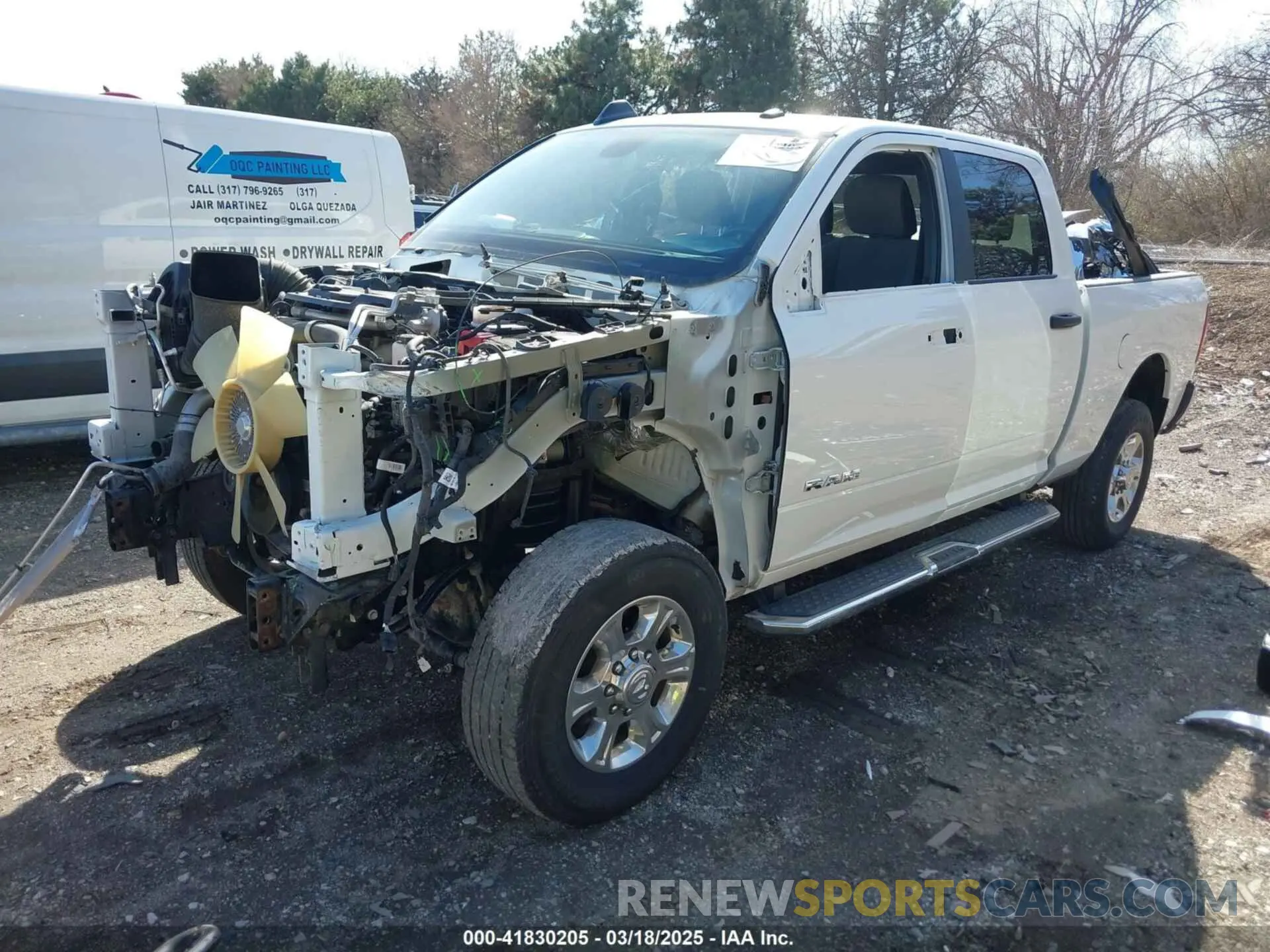 2 Photograph of a damaged car 3C6UR5DL0PG611149 RAM 2500 2023