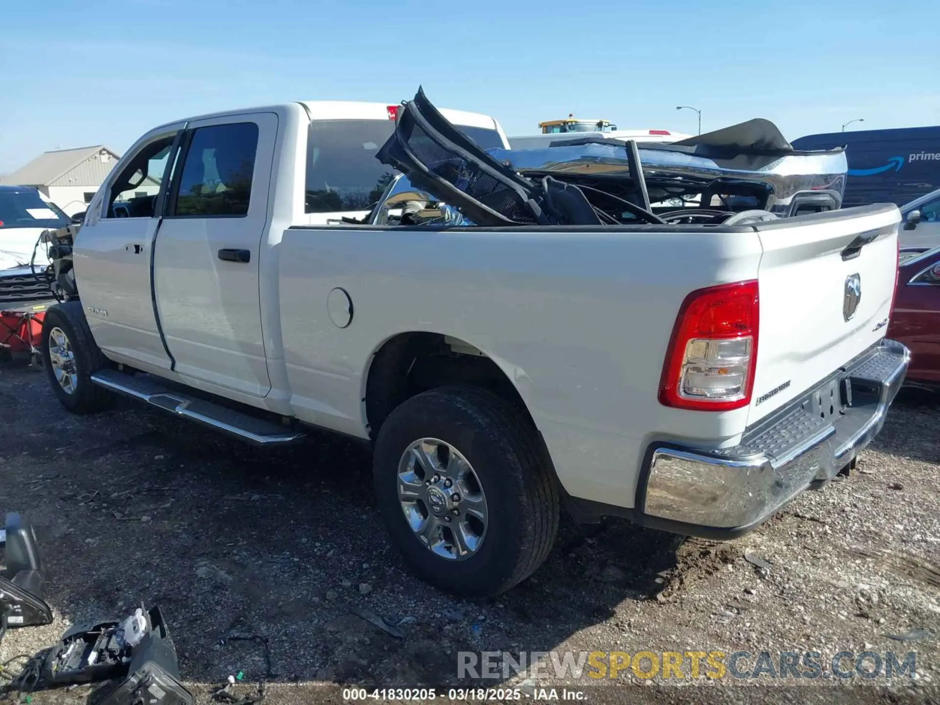 3 Photograph of a damaged car 3C6UR5DL0PG611149 RAM 2500 2023