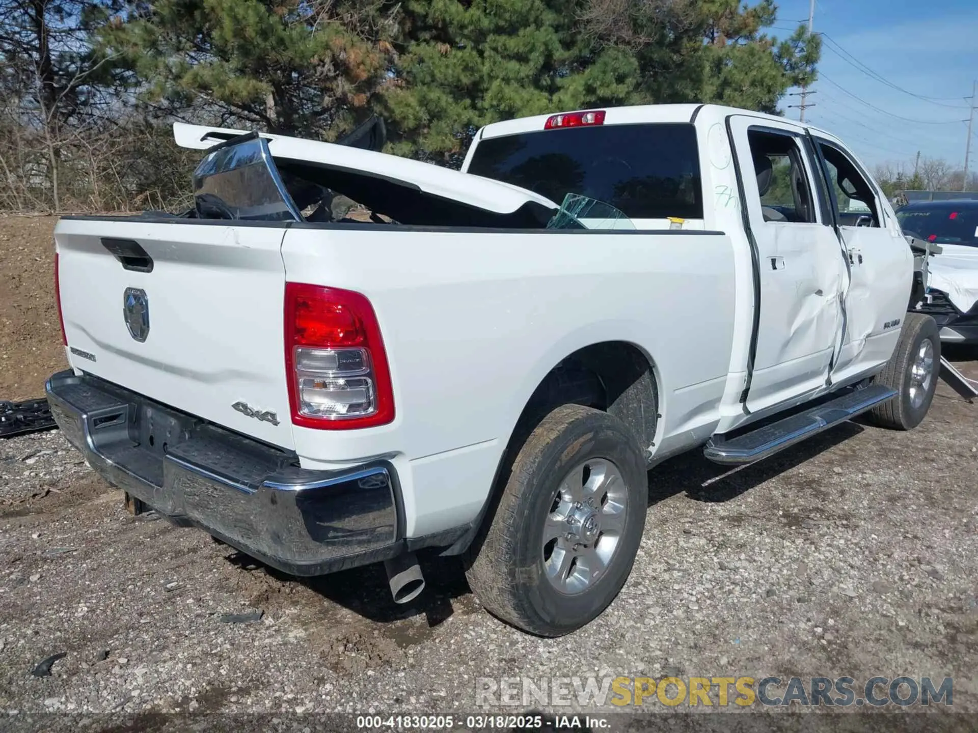 4 Photograph of a damaged car 3C6UR5DL0PG611149 RAM 2500 2023
