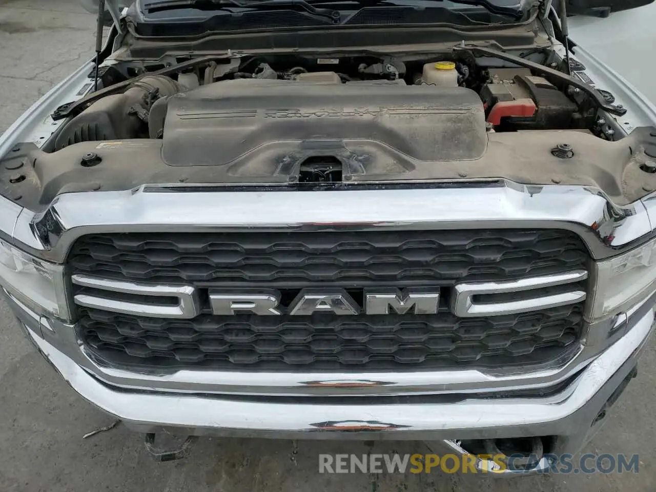 11 Photograph of a damaged car 3C6UR5DL0PG613323 RAM 2500 2023