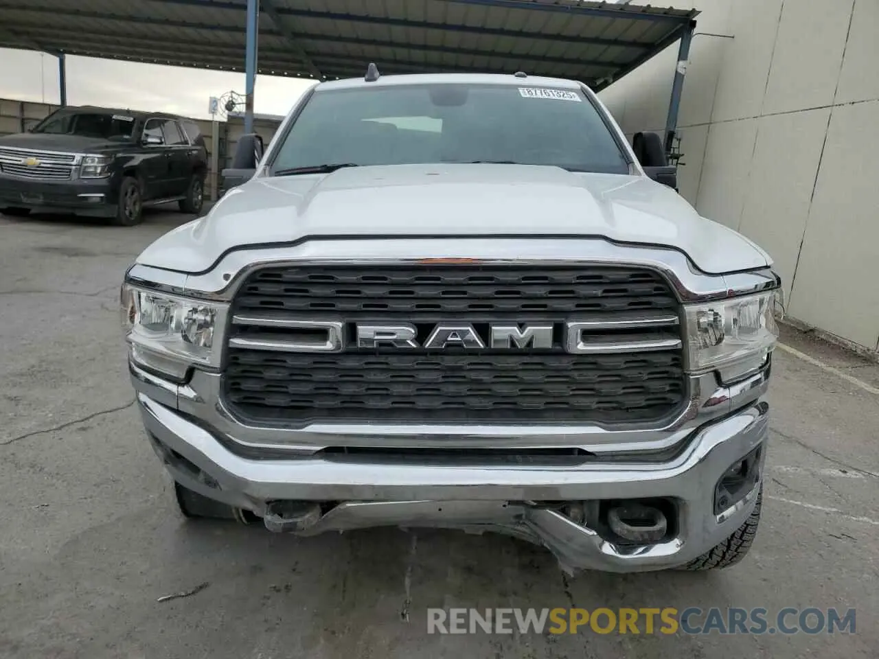 5 Photograph of a damaged car 3C6UR5DL0PG613323 RAM 2500 2023