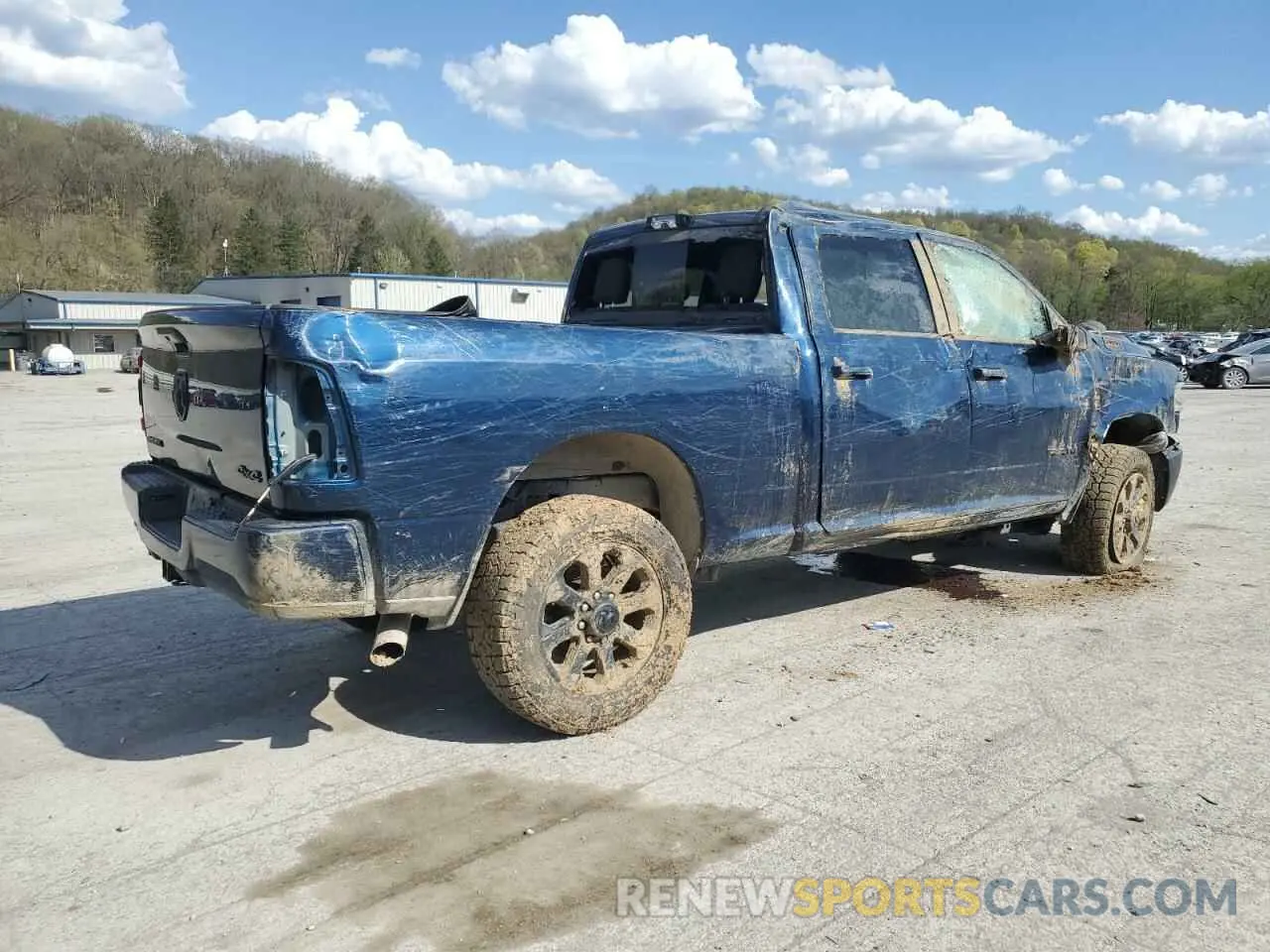 3 Photograph of a damaged car 3C6UR5DL0PG617792 RAM 2500 2023