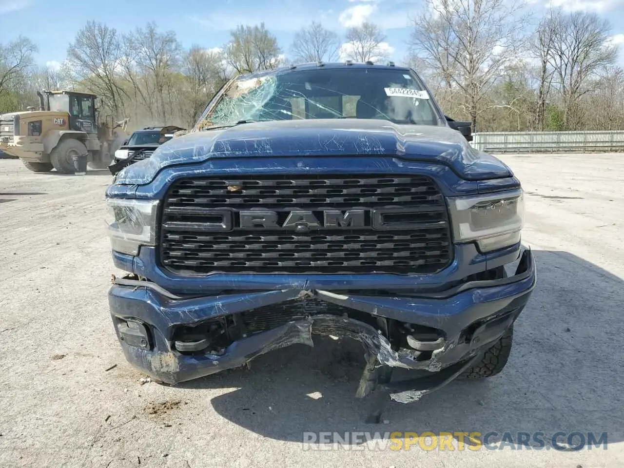 5 Photograph of a damaged car 3C6UR5DL0PG617792 RAM 2500 2023