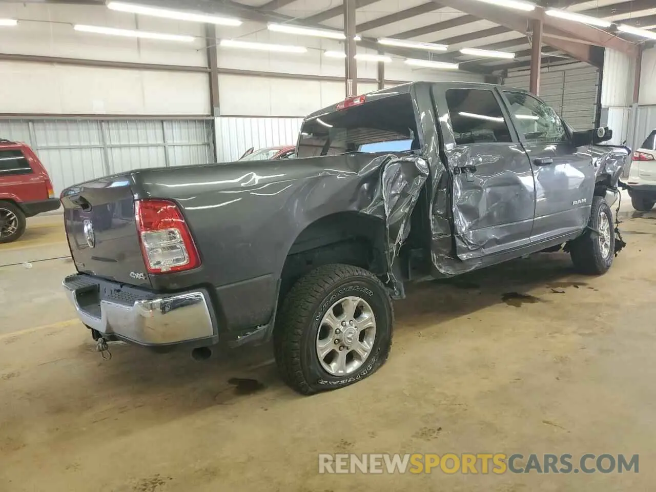 3 Photograph of a damaged car 3C6UR5DL1PG540186 RAM 2500 2023