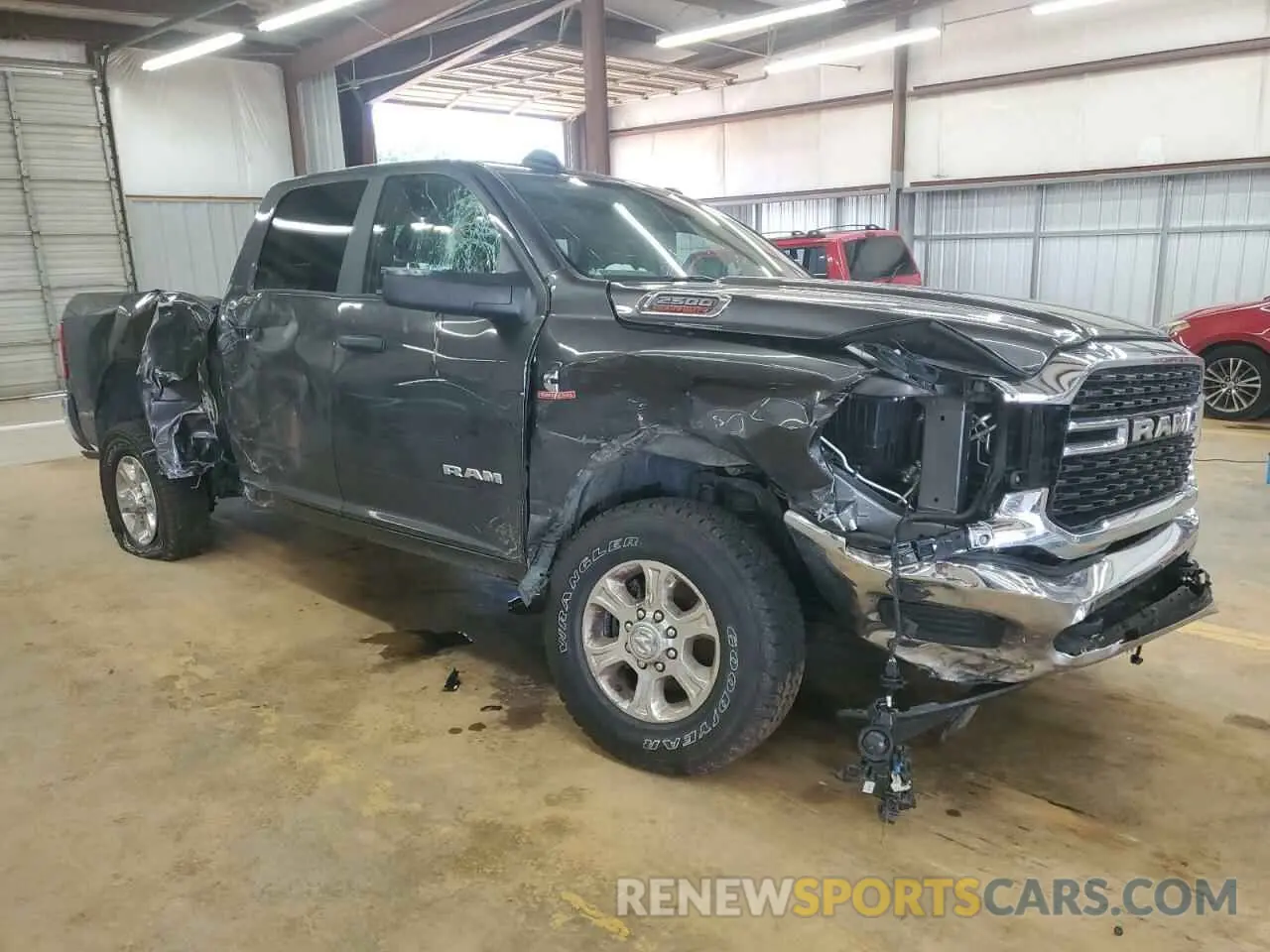 4 Photograph of a damaged car 3C6UR5DL1PG540186 RAM 2500 2023