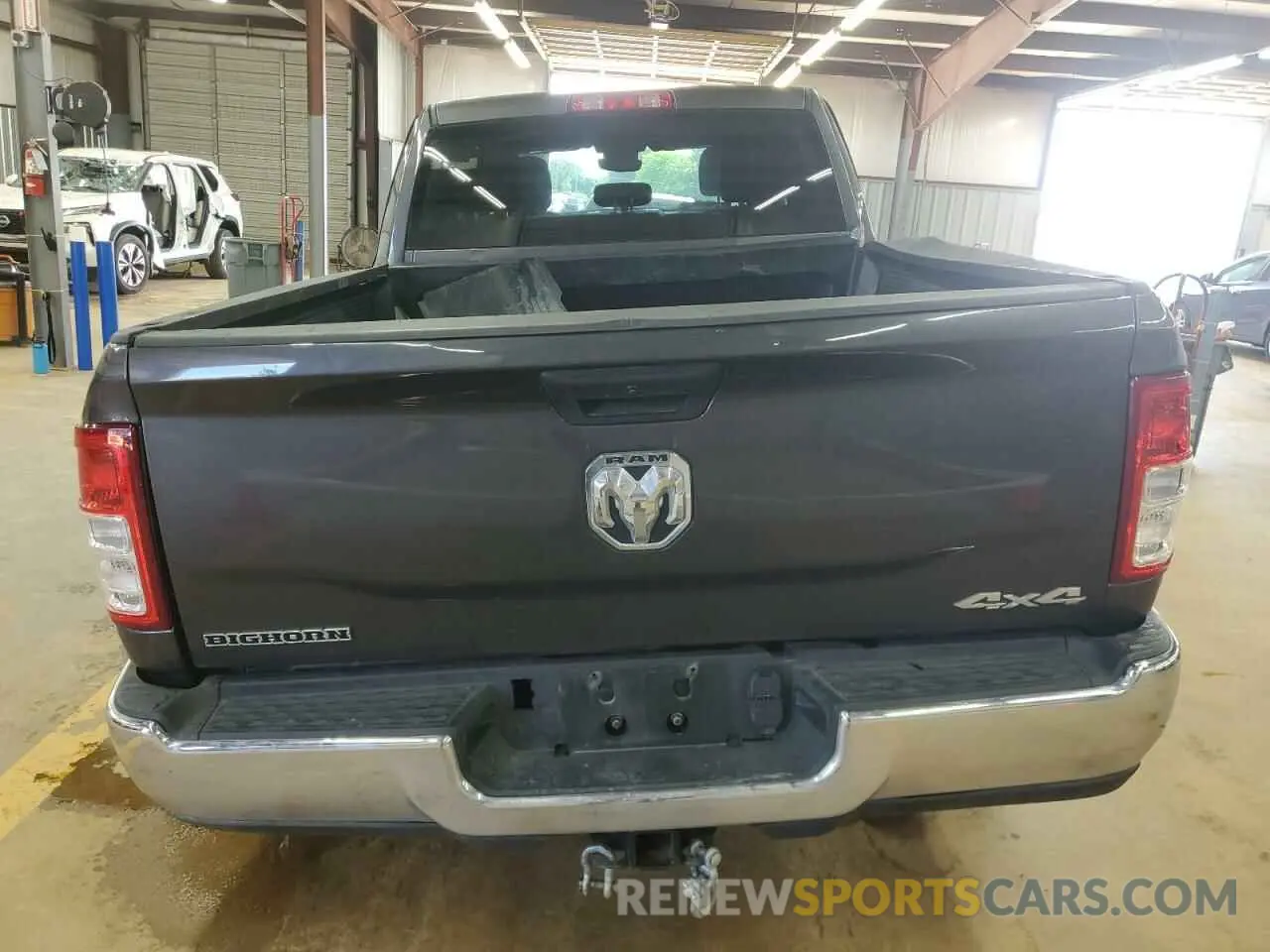 6 Photograph of a damaged car 3C6UR5DL1PG540186 RAM 2500 2023
