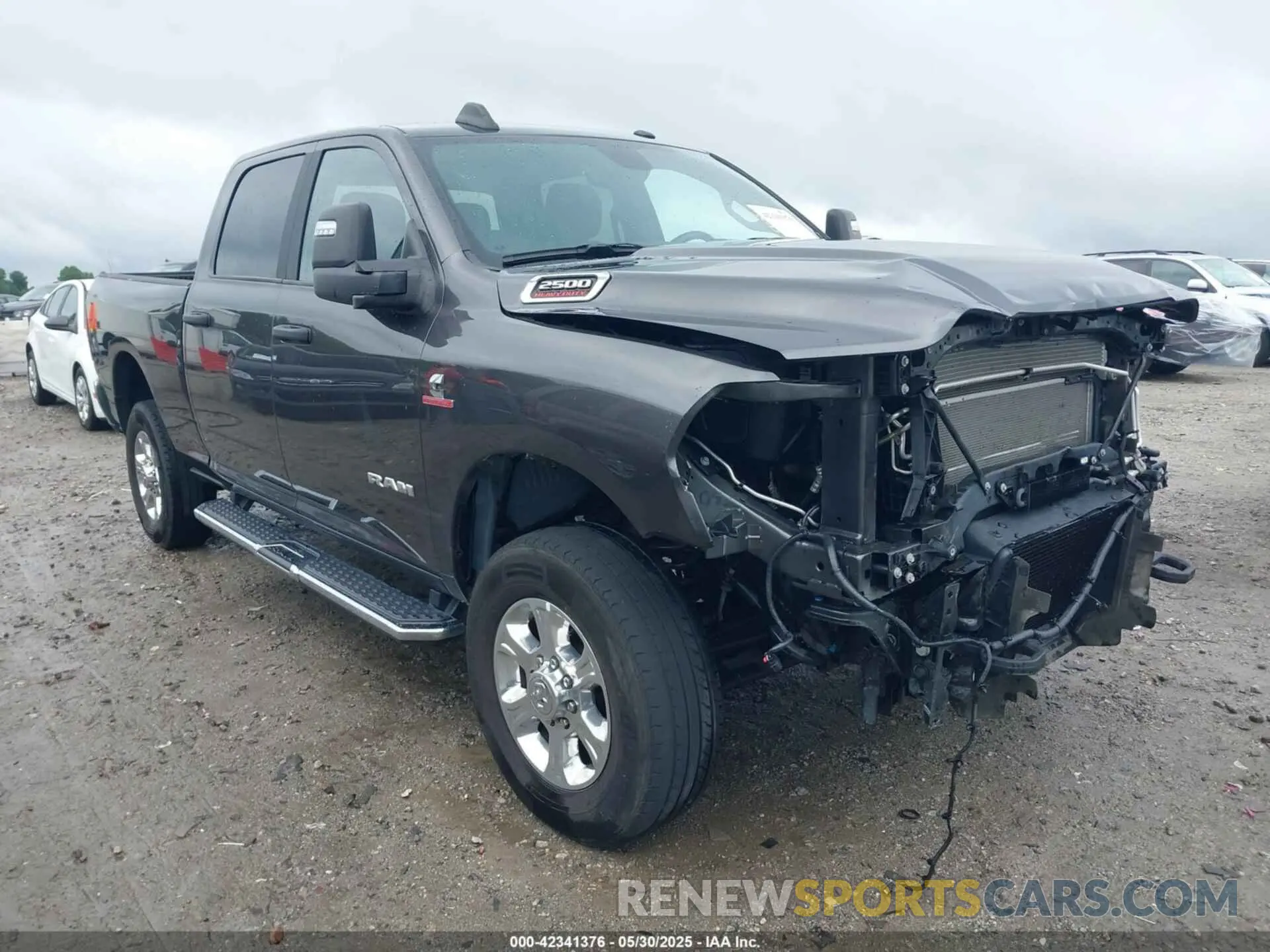 1 Photograph of a damaged car 3C6UR5DL3PG651435 RAM 2500 2023