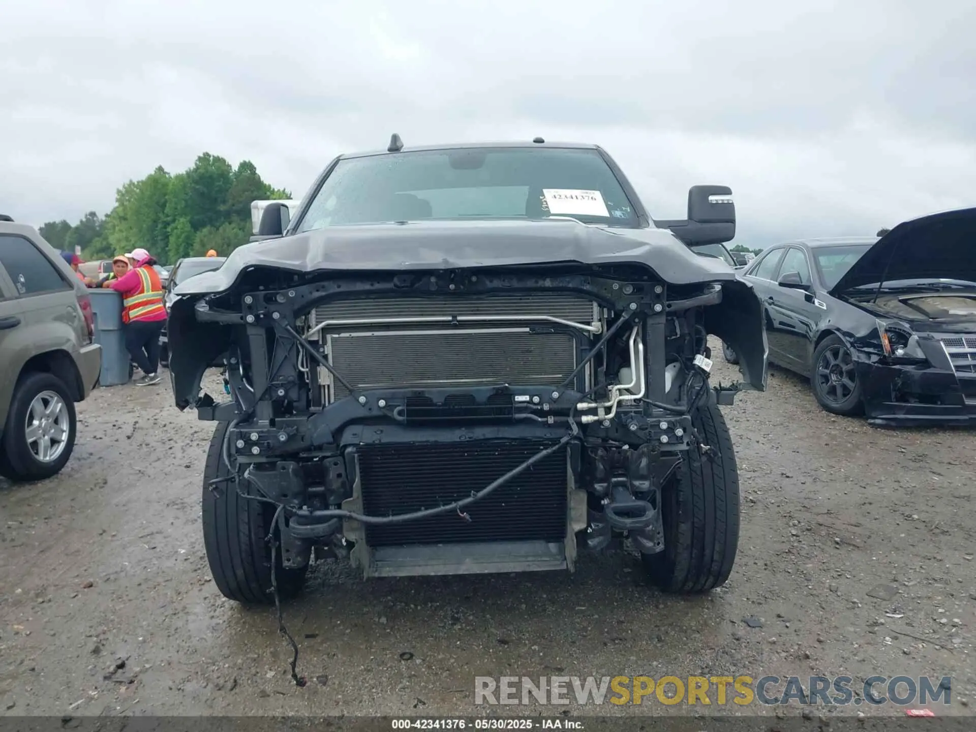 13 Photograph of a damaged car 3C6UR5DL3PG651435 RAM 2500 2023