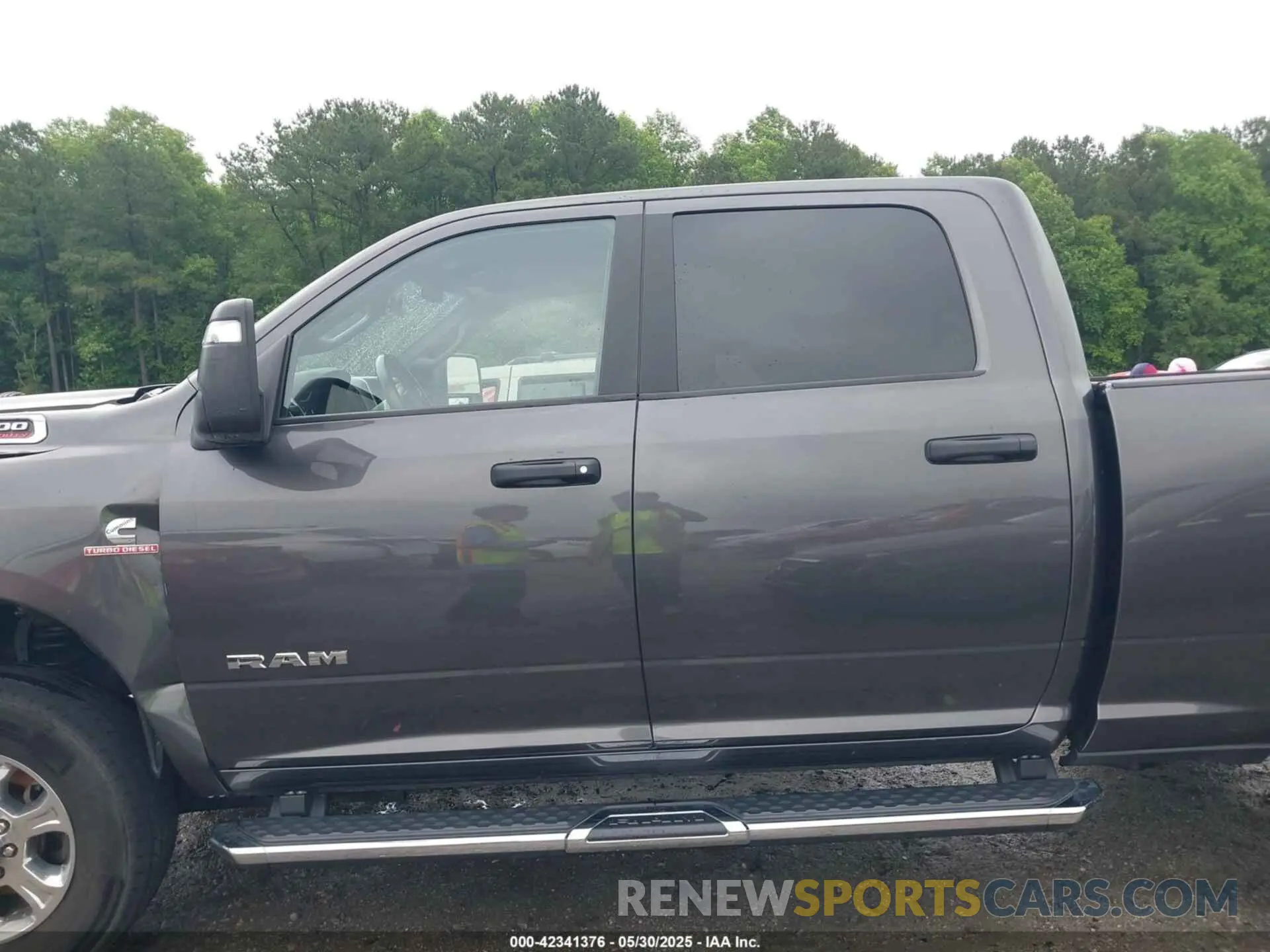 15 Photograph of a damaged car 3C6UR5DL3PG651435 RAM 2500 2023
