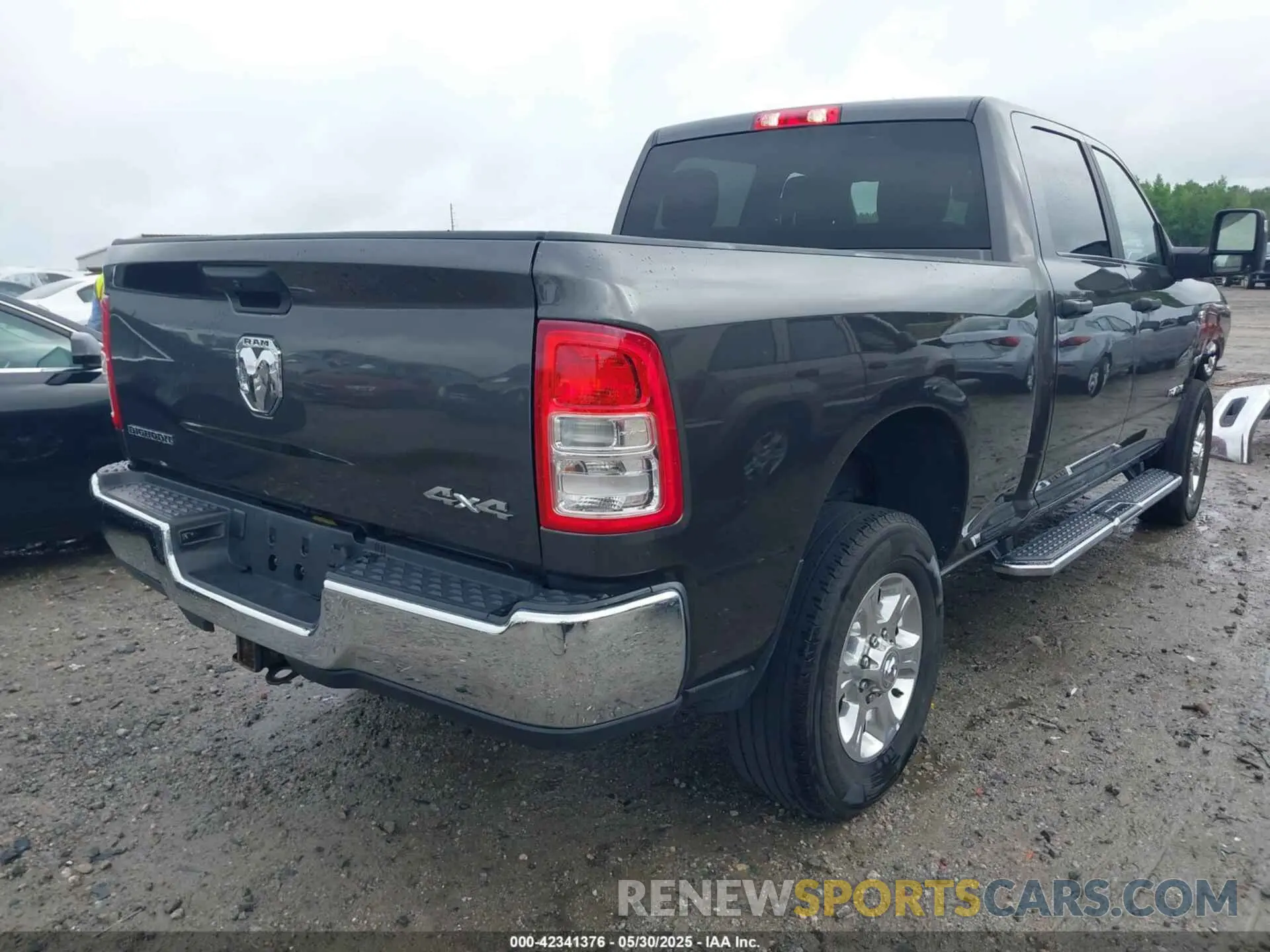 4 Photograph of a damaged car 3C6UR5DL3PG651435 RAM 2500 2023