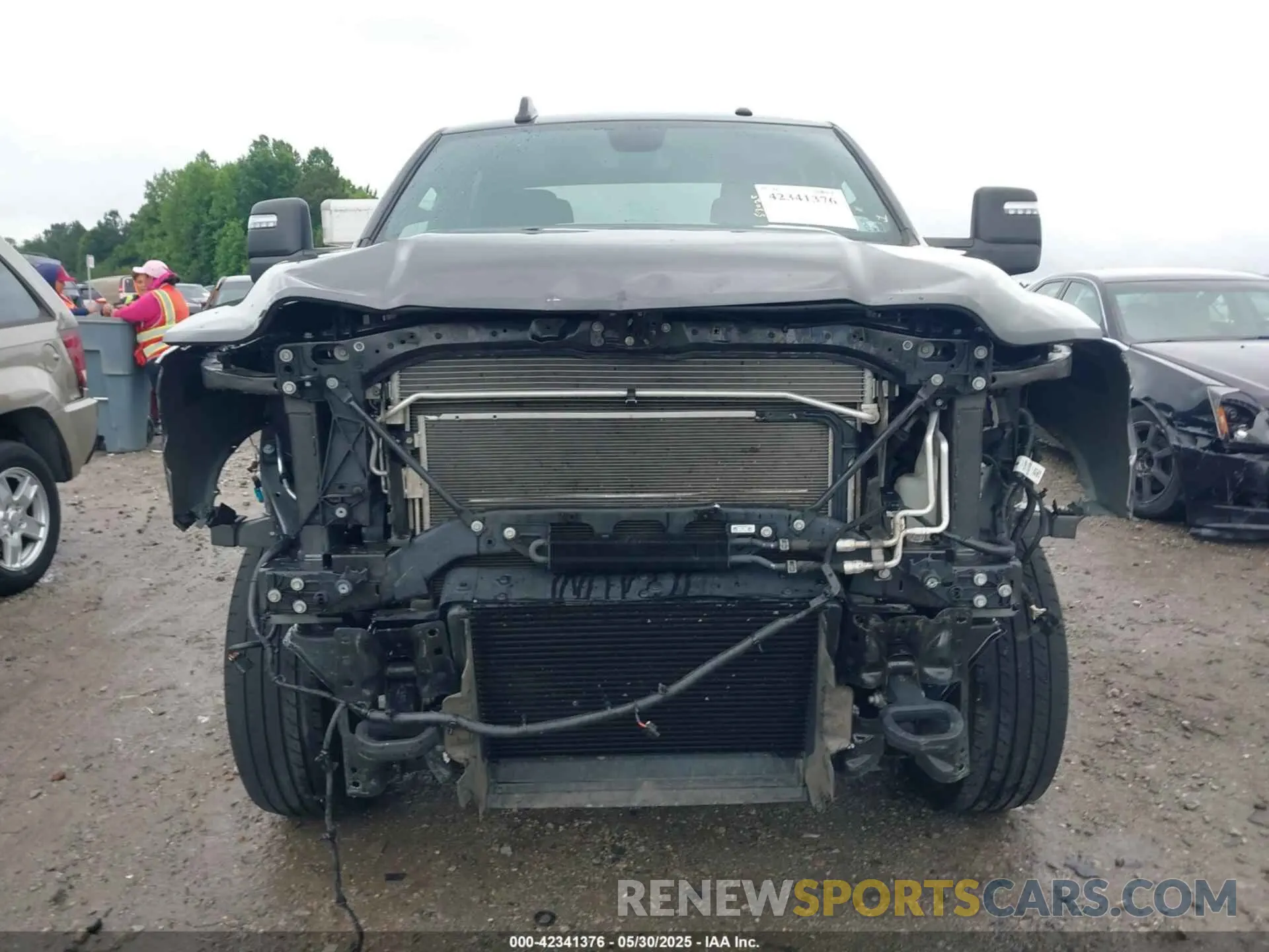6 Photograph of a damaged car 3C6UR5DL3PG651435 RAM 2500 2023