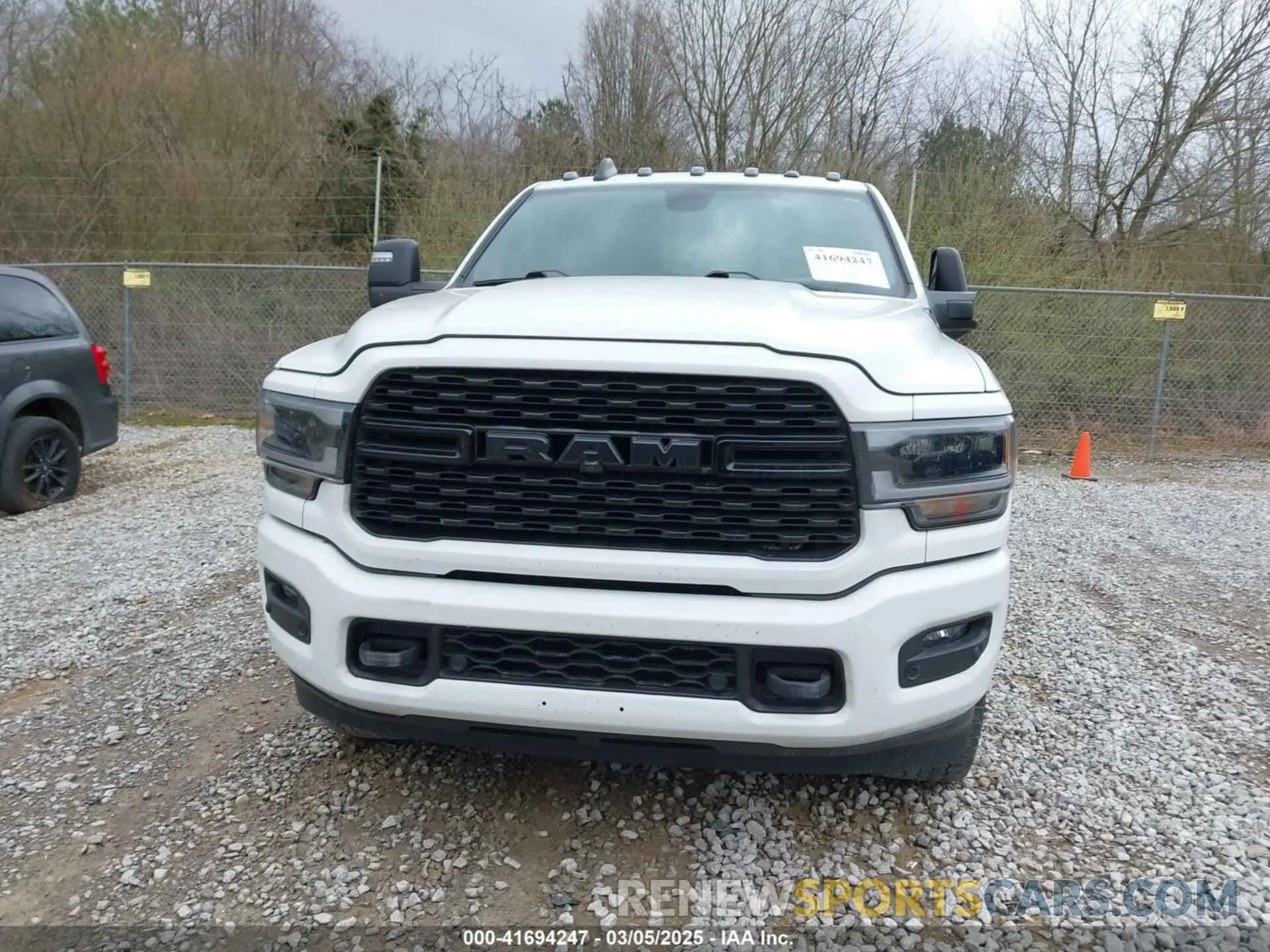 12 Photograph of a damaged car 3C6UR5DL4PG529196 RAM 2500 2023