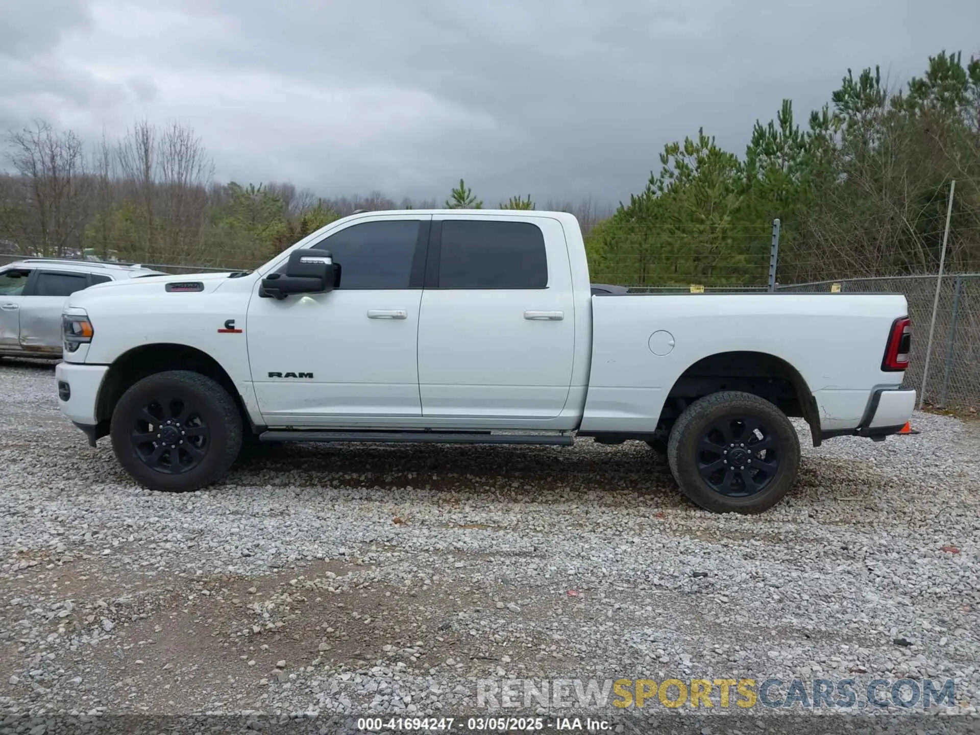 14 Photograph of a damaged car 3C6UR5DL4PG529196 RAM 2500 2023