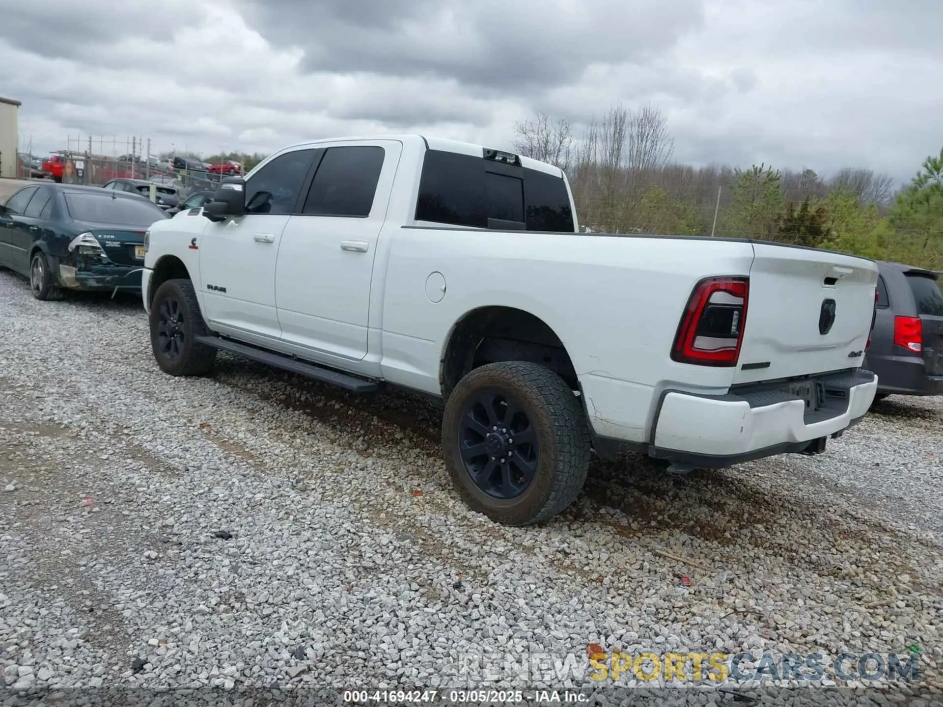 3 Photograph of a damaged car 3C6UR5DL4PG529196 RAM 2500 2023