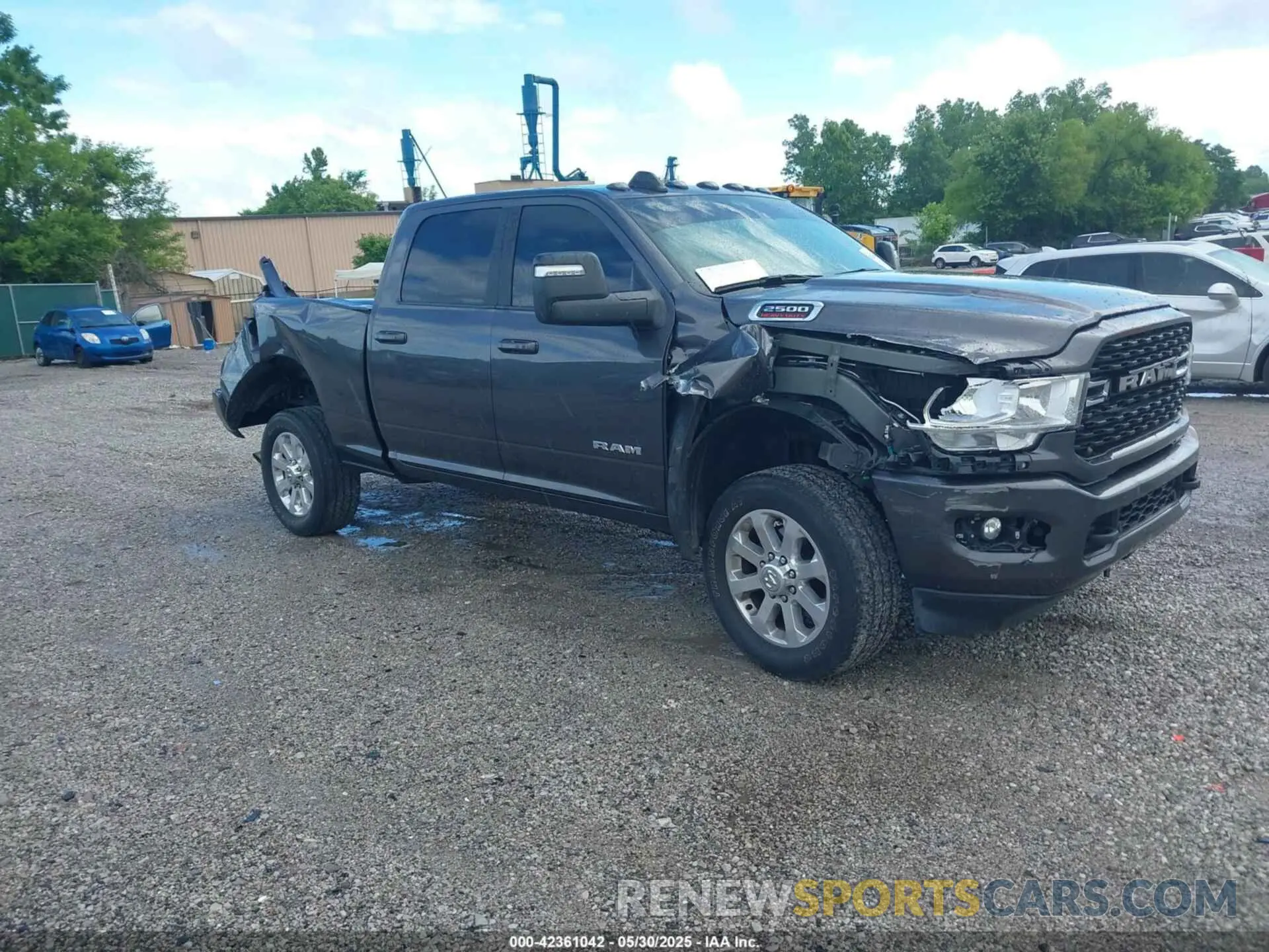 1 Photograph of a damaged car 3C6UR5DL5PG628593 RAM 2500 2023