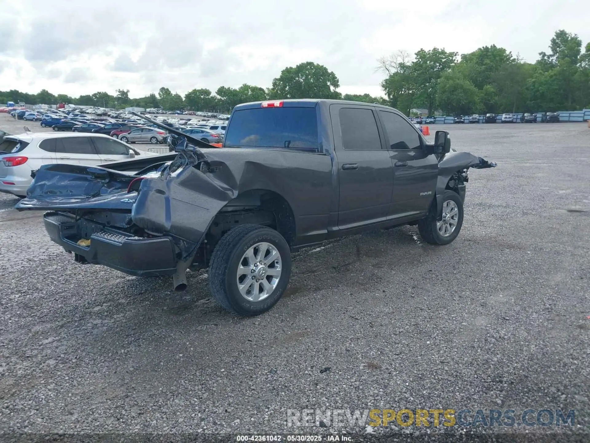 4 Photograph of a damaged car 3C6UR5DL5PG628593 RAM 2500 2023