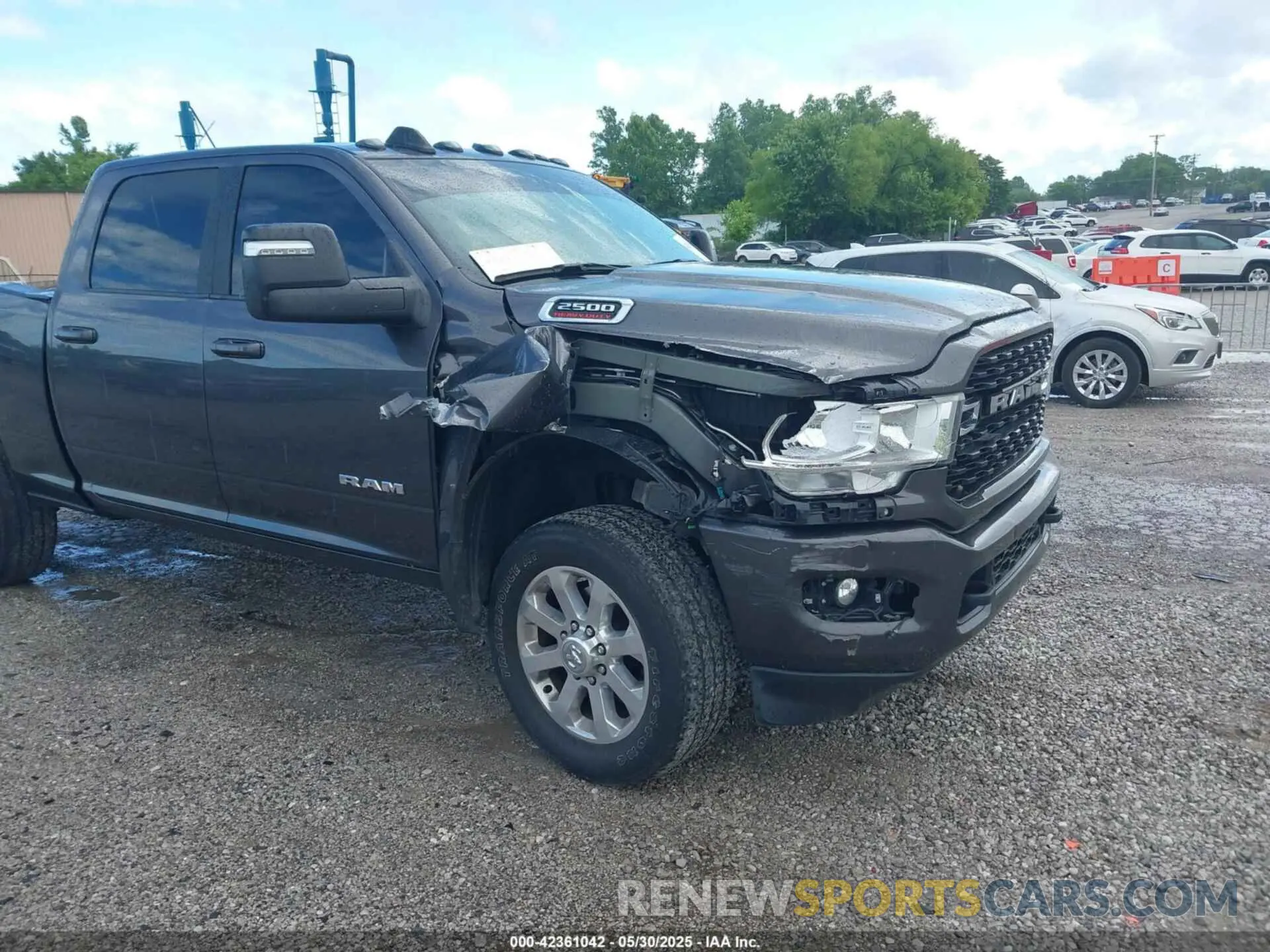 6 Photograph of a damaged car 3C6UR5DL5PG628593 RAM 2500 2023