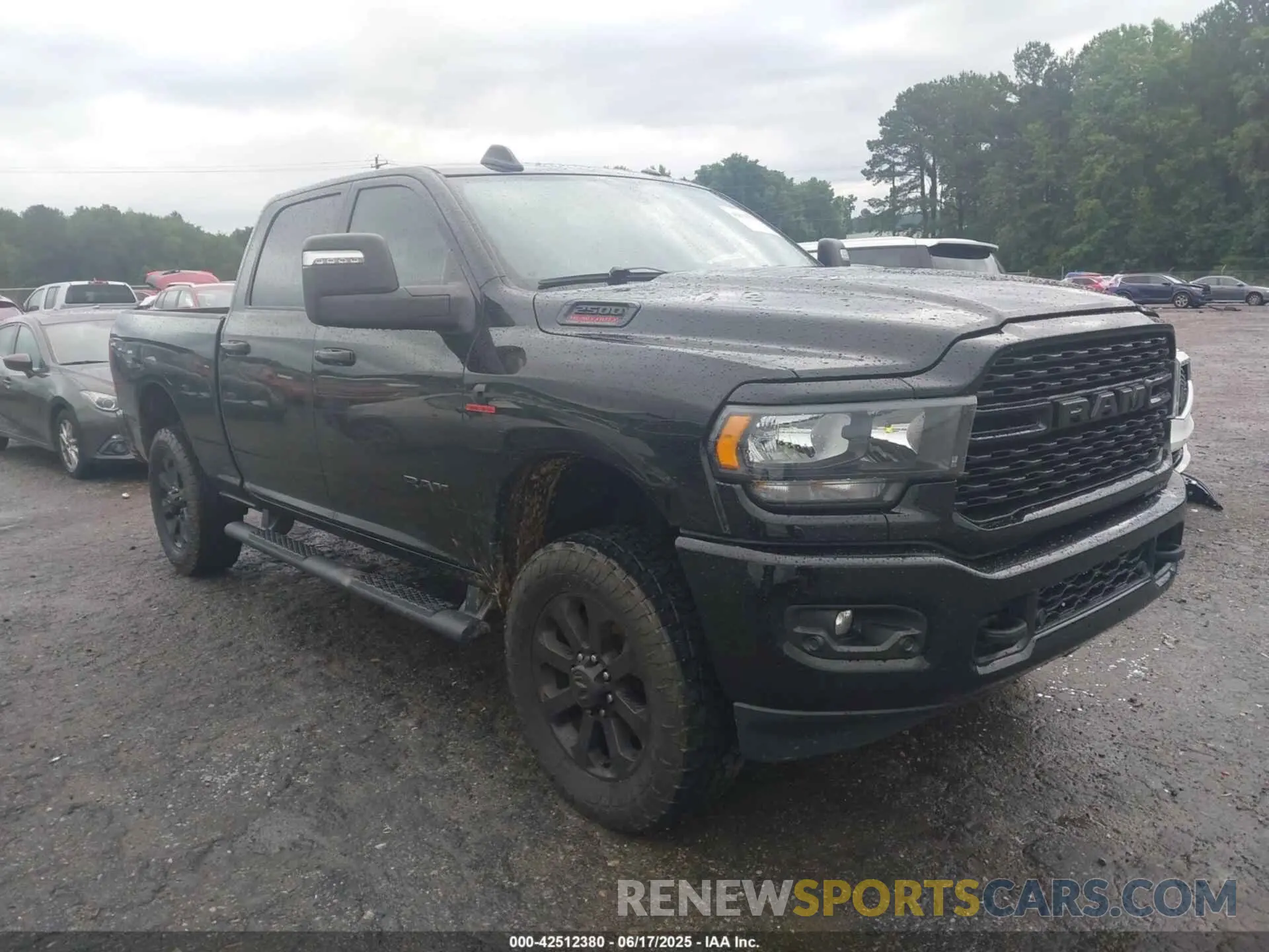 1 Photograph of a damaged car 3C6UR5DL6PG504090 RAM 2500 2023
