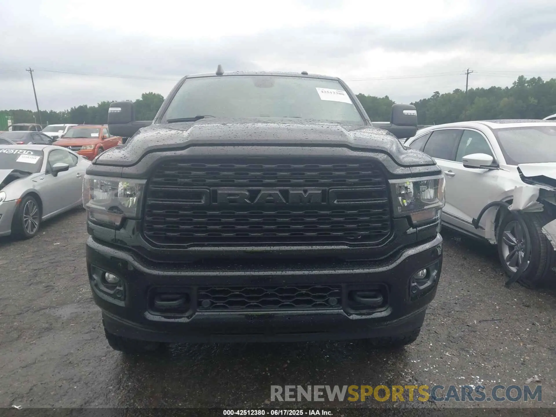 12 Photograph of a damaged car 3C6UR5DL6PG504090 RAM 2500 2023