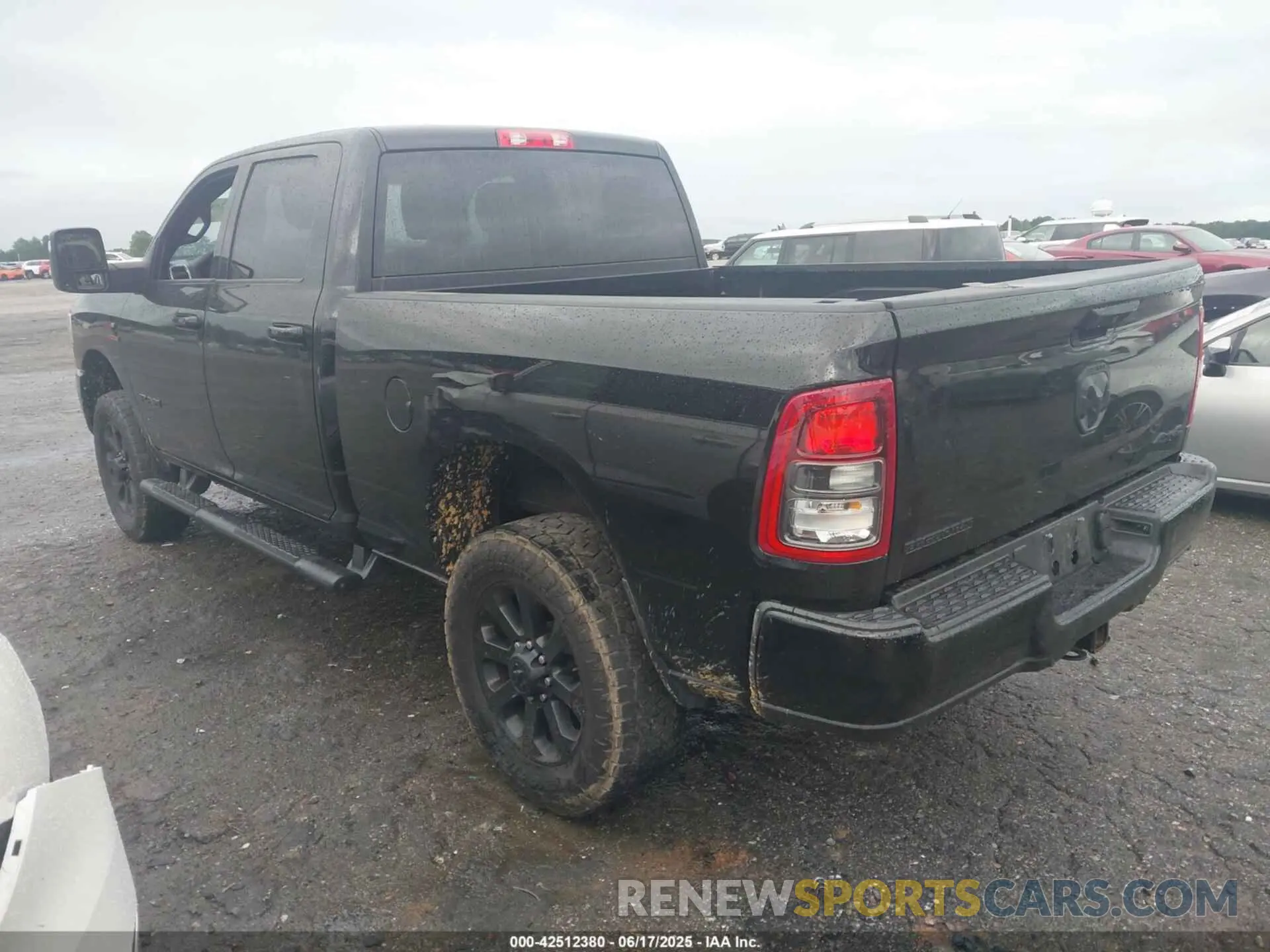 3 Photograph of a damaged car 3C6UR5DL6PG504090 RAM 2500 2023