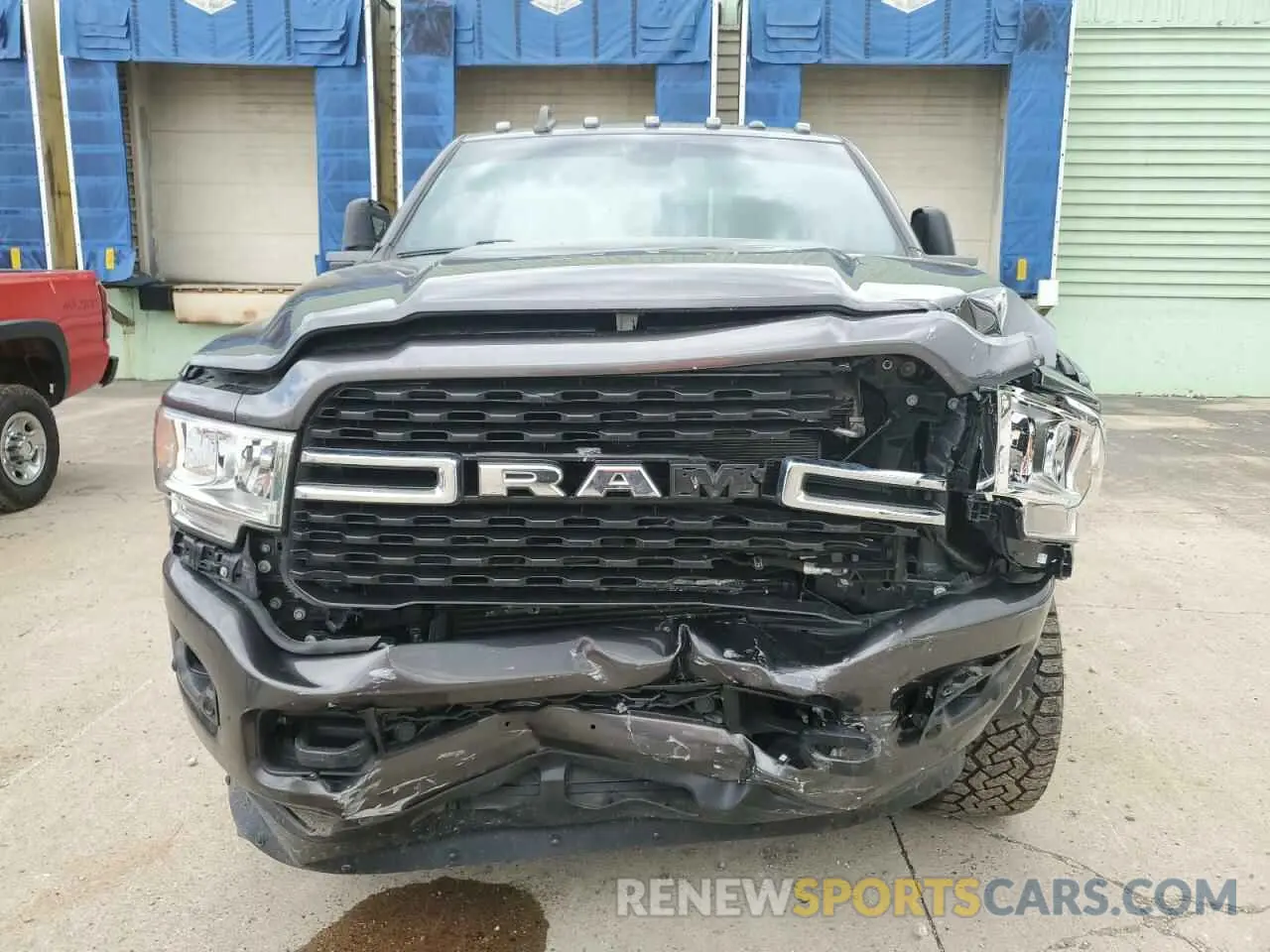 5 Photograph of a damaged car 3C6UR5DL7PG517320 RAM 2500 2023