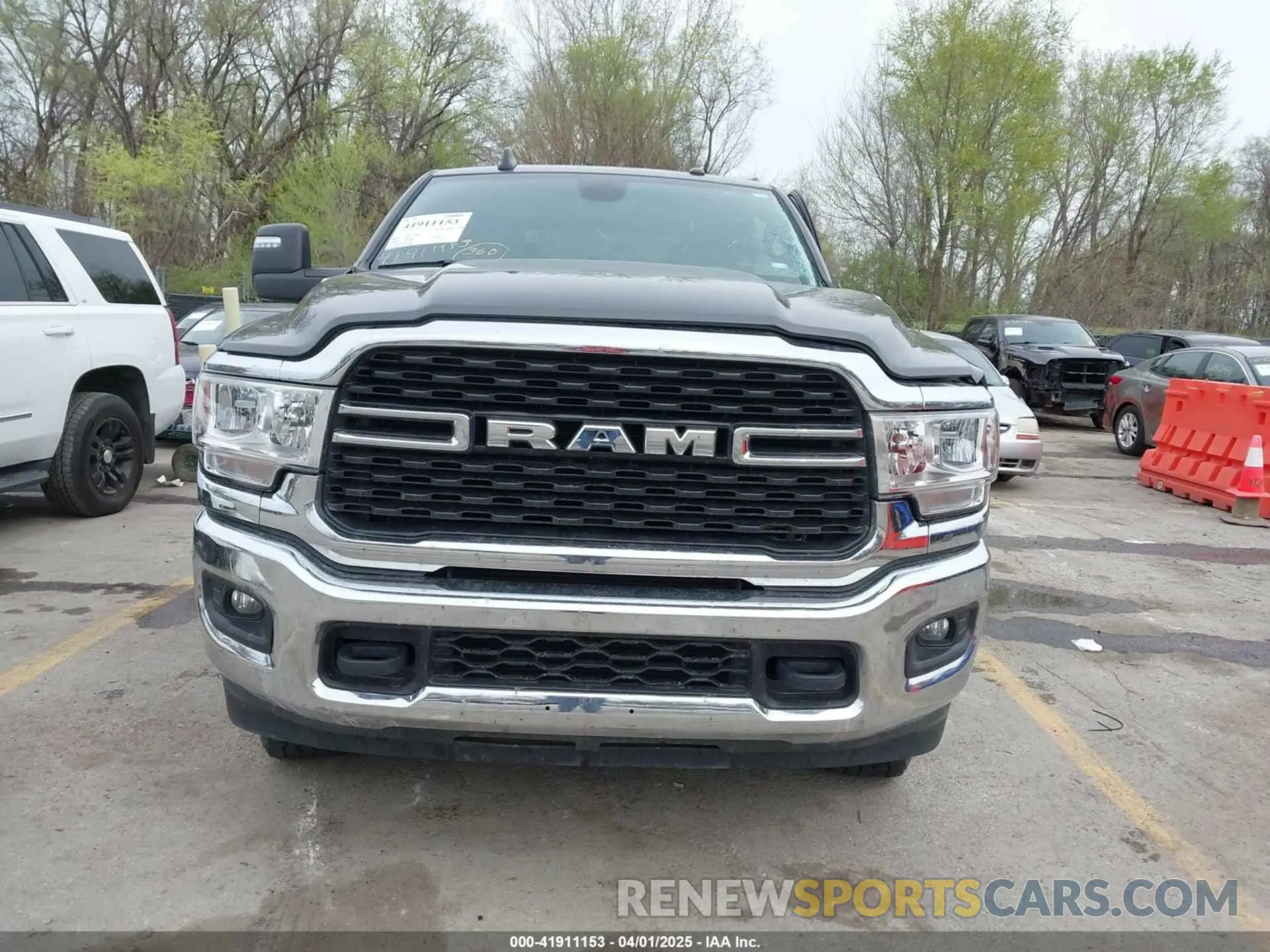 11 Photograph of a damaged car 3C6UR5DL8PG611061 RAM 2500 2023