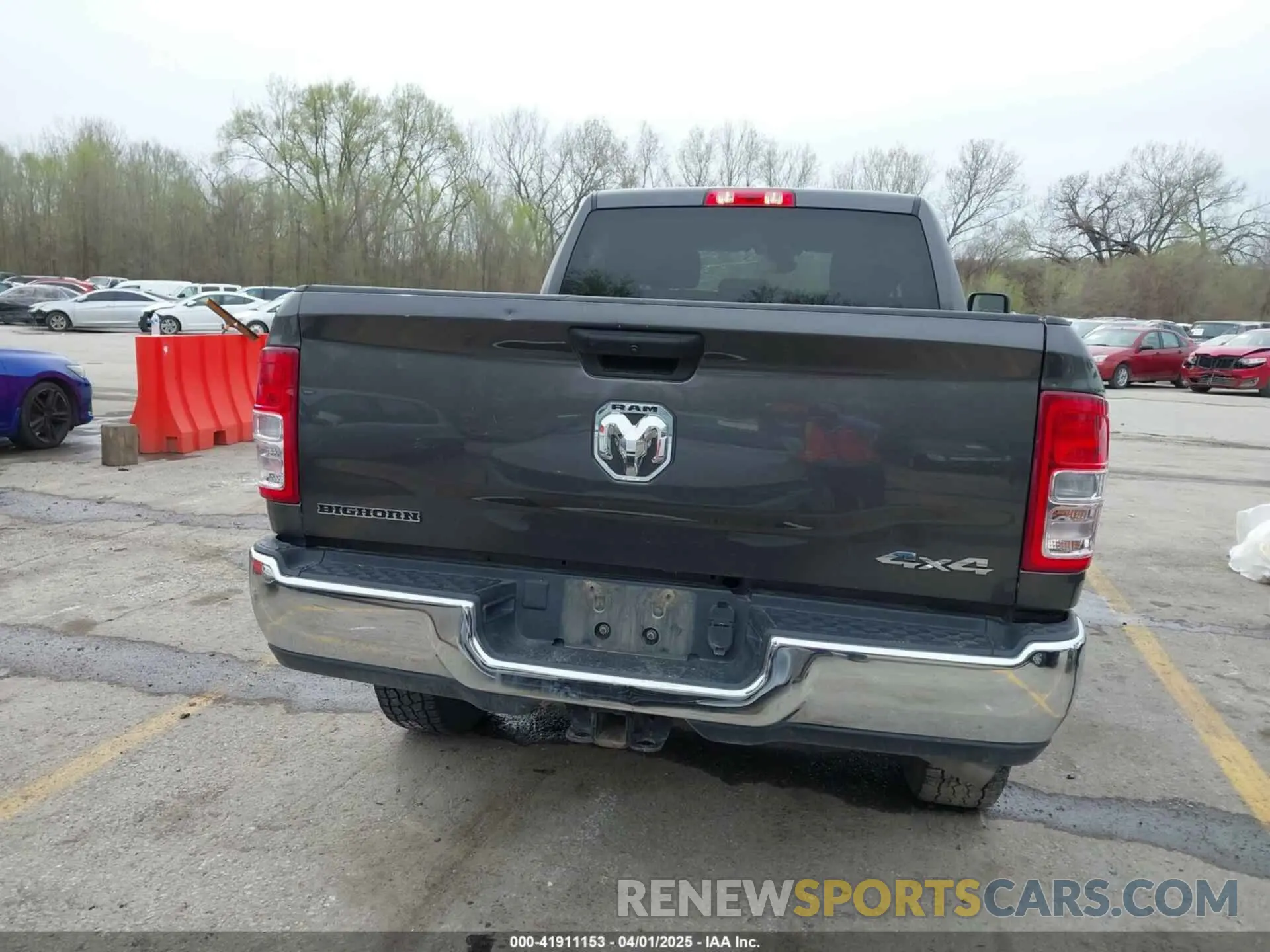 15 Photograph of a damaged car 3C6UR5DL8PG611061 RAM 2500 2023