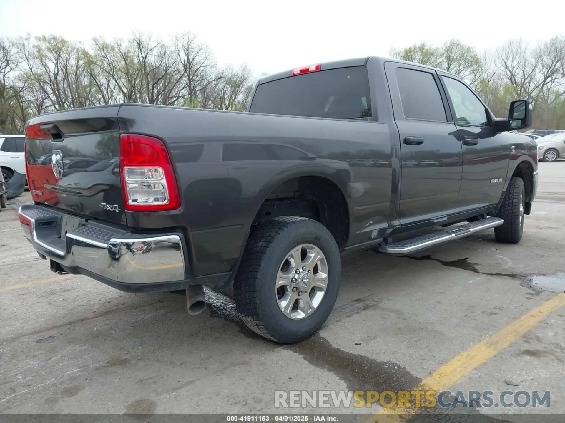 4 Photograph of a damaged car 3C6UR5DL8PG611061 RAM 2500 2023