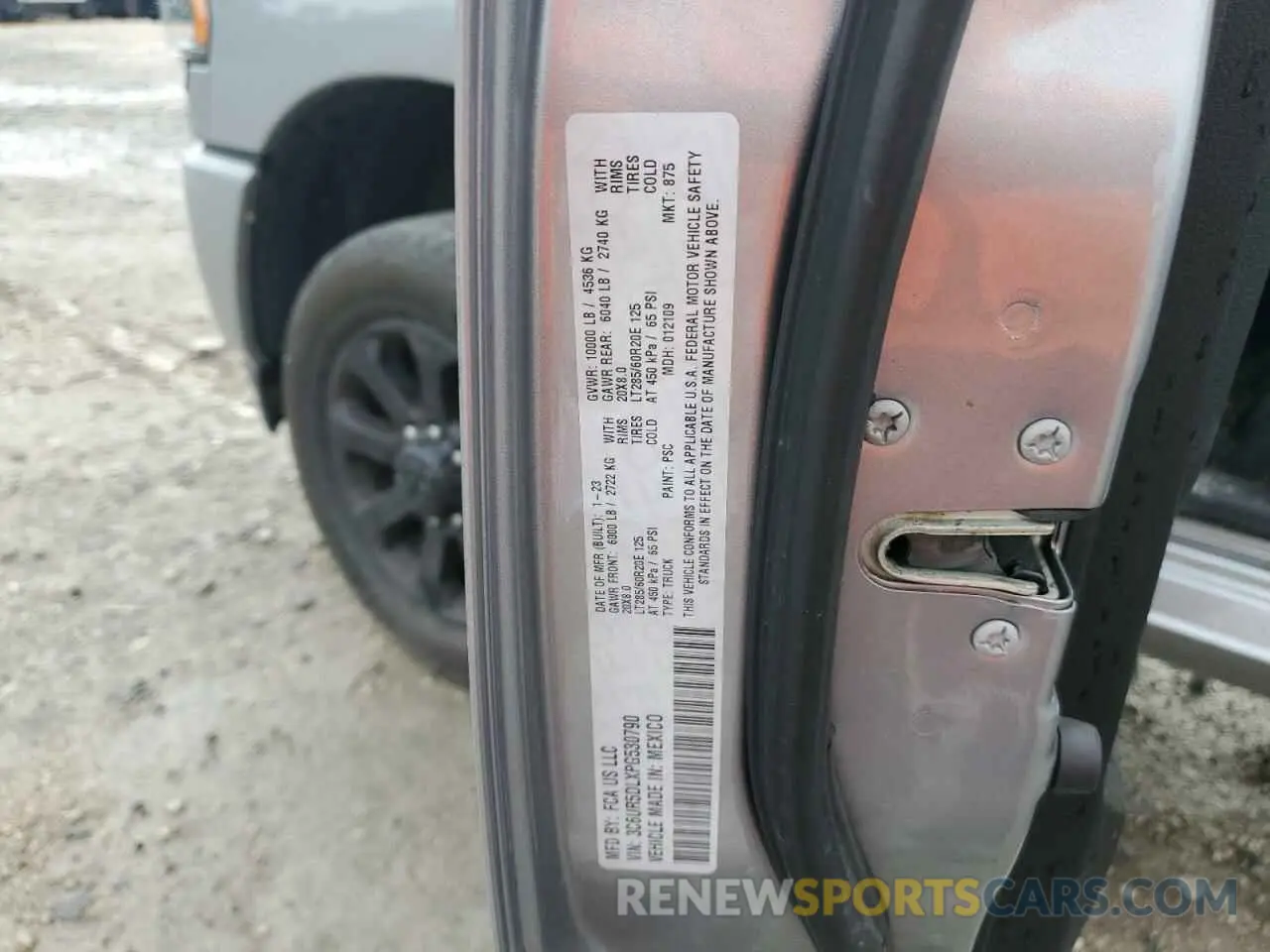 12 Photograph of a damaged car 3C6UR5DLXPG530790 RAM 2500 2023