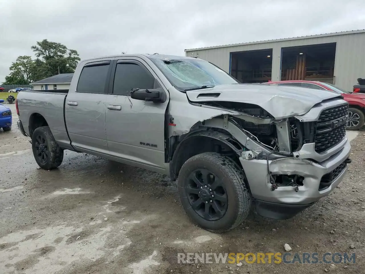 4 Photograph of a damaged car 3C6UR5DLXPG530790 RAM 2500 2023