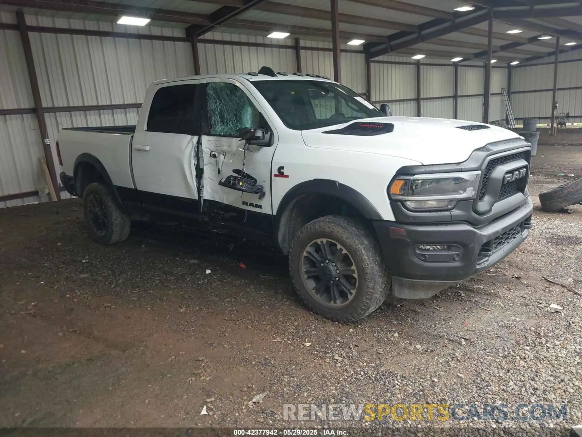 1 Photograph of a damaged car 3C6UR5EL0PG568608 RAM 2500 2023