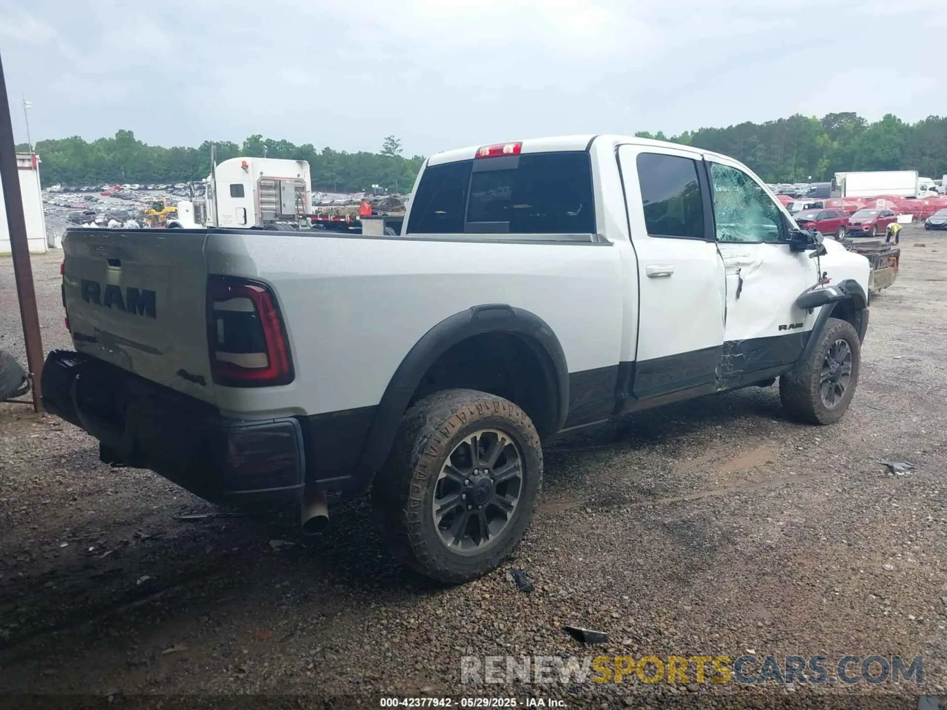 4 Photograph of a damaged car 3C6UR5EL0PG568608 RAM 2500 2023