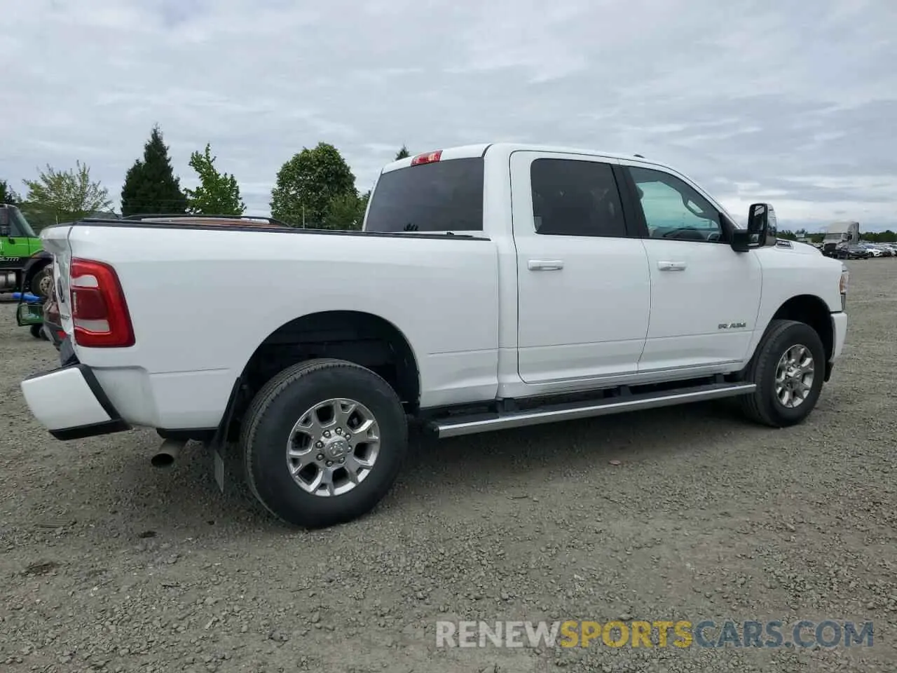 3 Photograph of a damaged car 3C6UR5FJ1PG634158 RAM 2500 2023