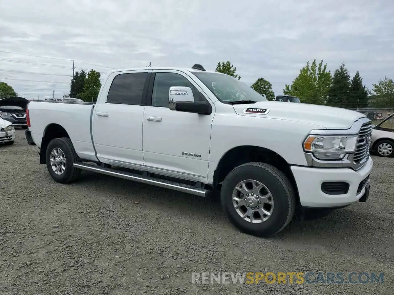 4 Photograph of a damaged car 3C6UR5FJ1PG634158 RAM 2500 2023