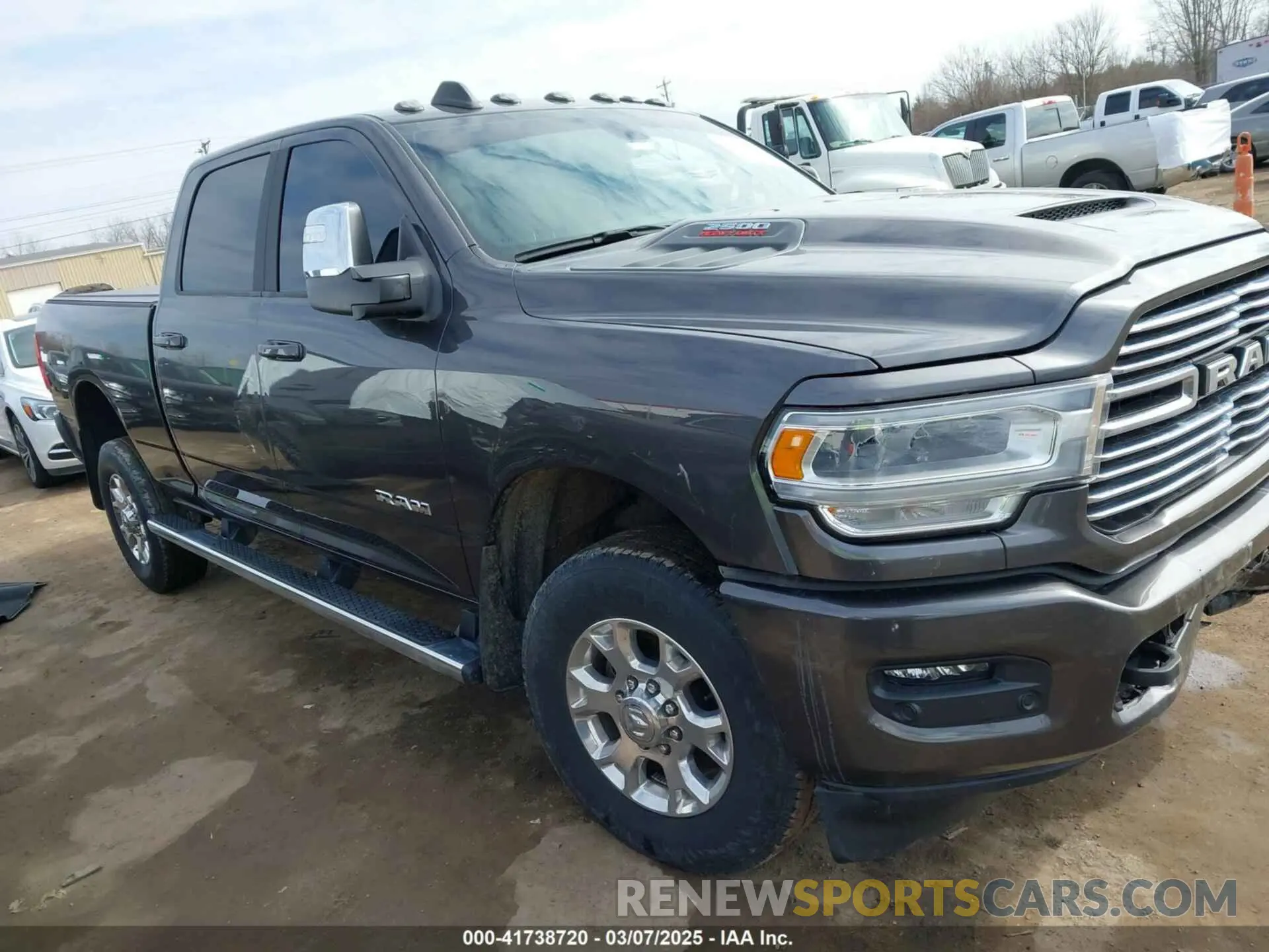 1 Photograph of a damaged car 3C6UR5FJ6PG614424 RAM 2500 2023