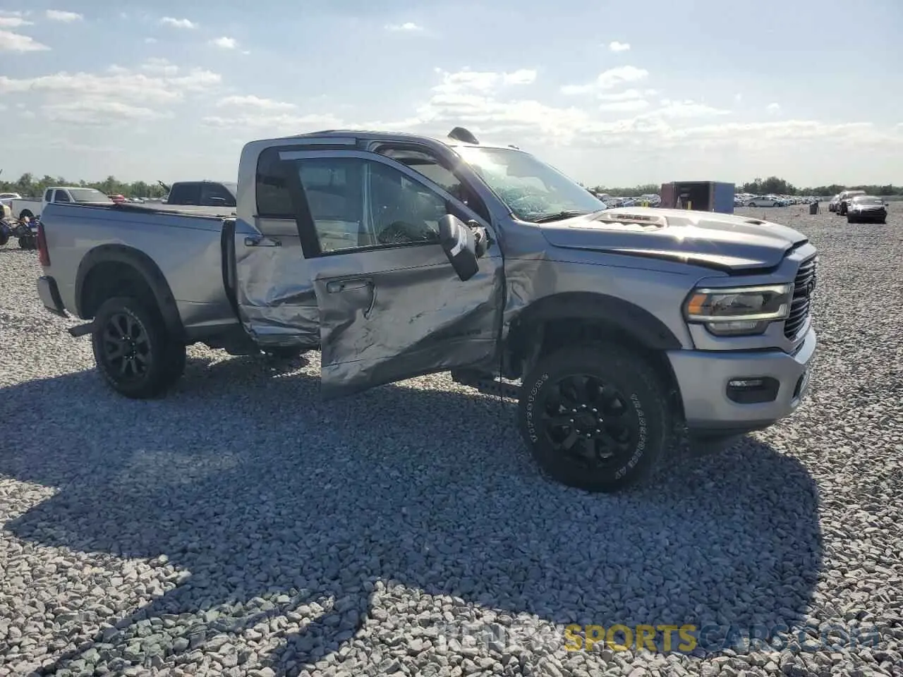4 Photograph of a damaged car 3C6UR5FJXPG614328 RAM 2500 2023