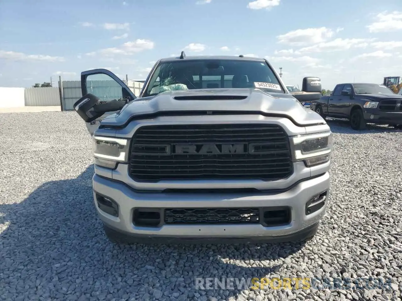 5 Photograph of a damaged car 3C6UR5FJXPG614328 RAM 2500 2023