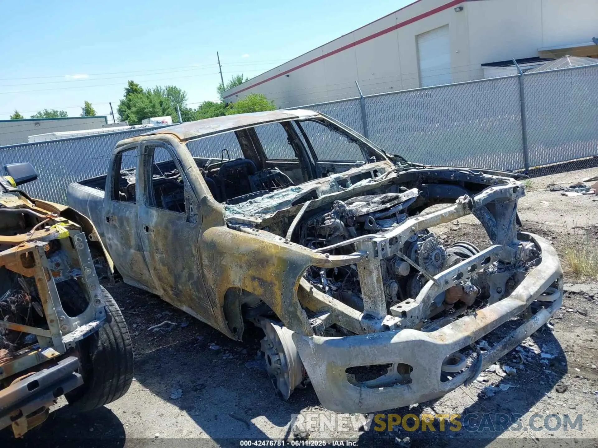 1 Photograph of a damaged car 3C6UR5FL2PG538072 RAM 2500 2023