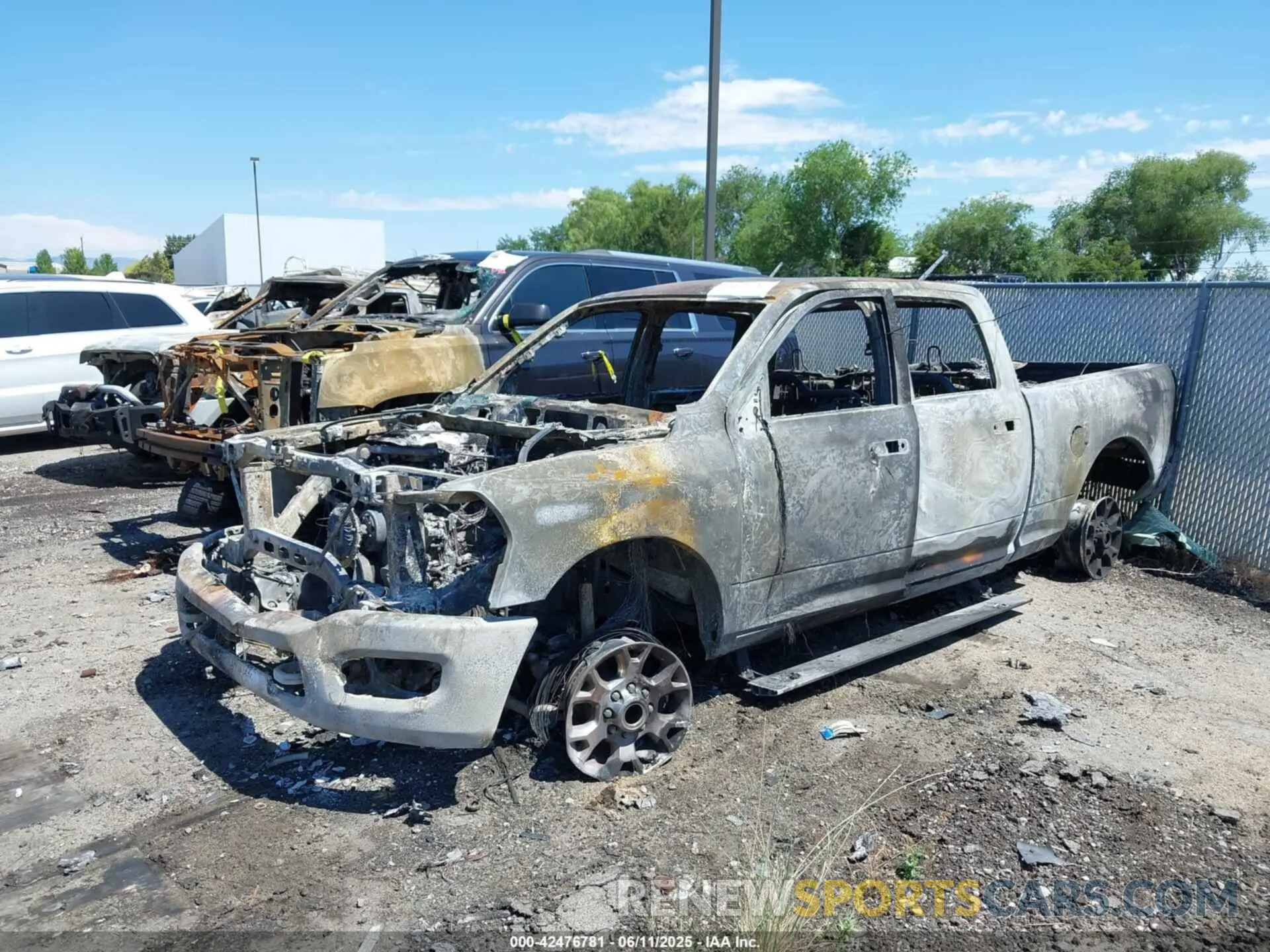 2 Photograph of a damaged car 3C6UR5FL2PG538072 RAM 2500 2023