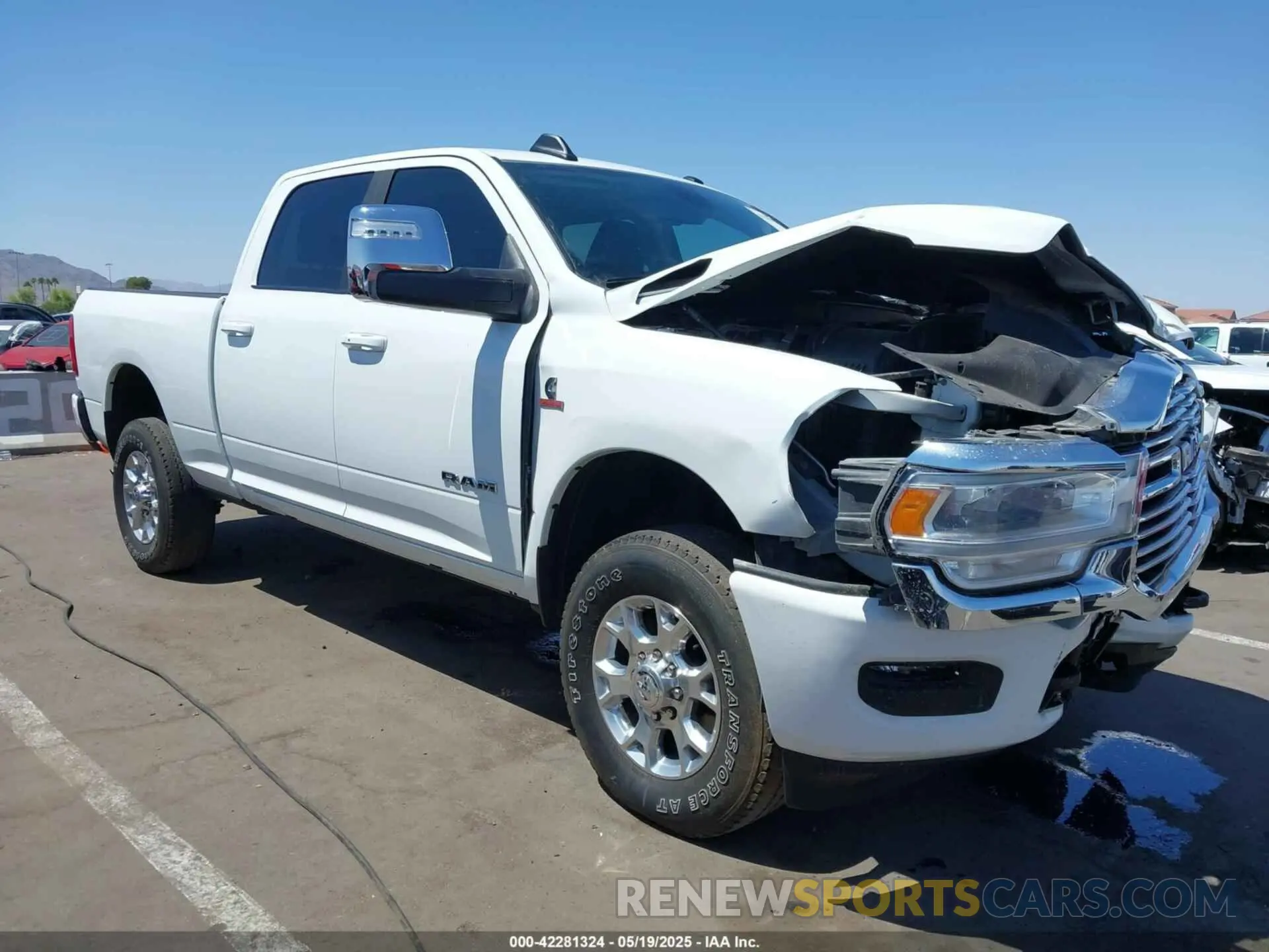 1 Photograph of a damaged car 3C6UR5FL2PG559276 RAM 2500 2023