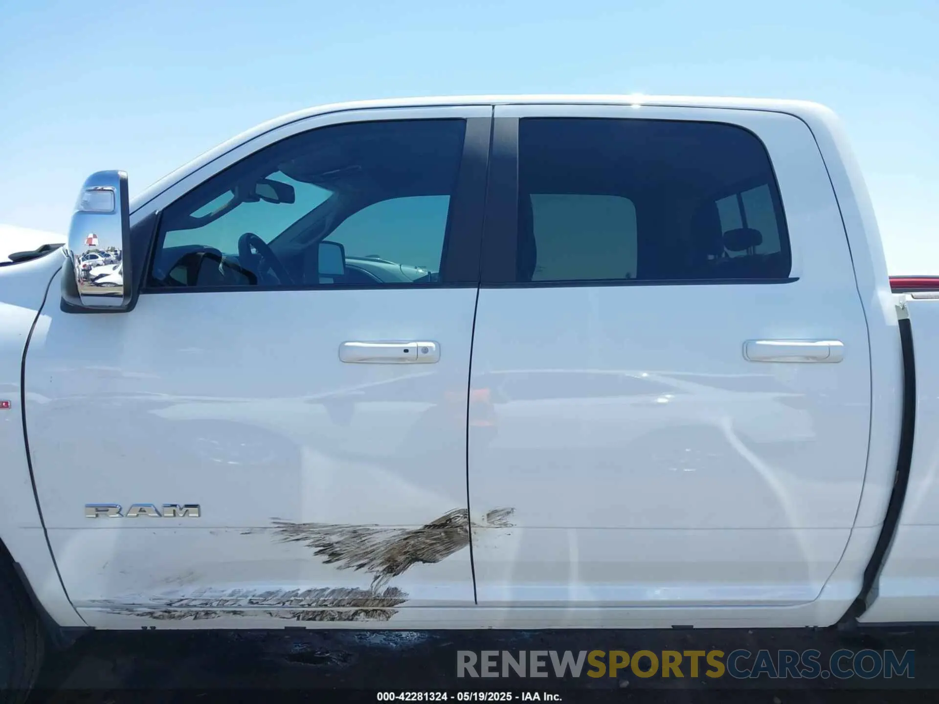 14 Photograph of a damaged car 3C6UR5FL2PG559276 RAM 2500 2023