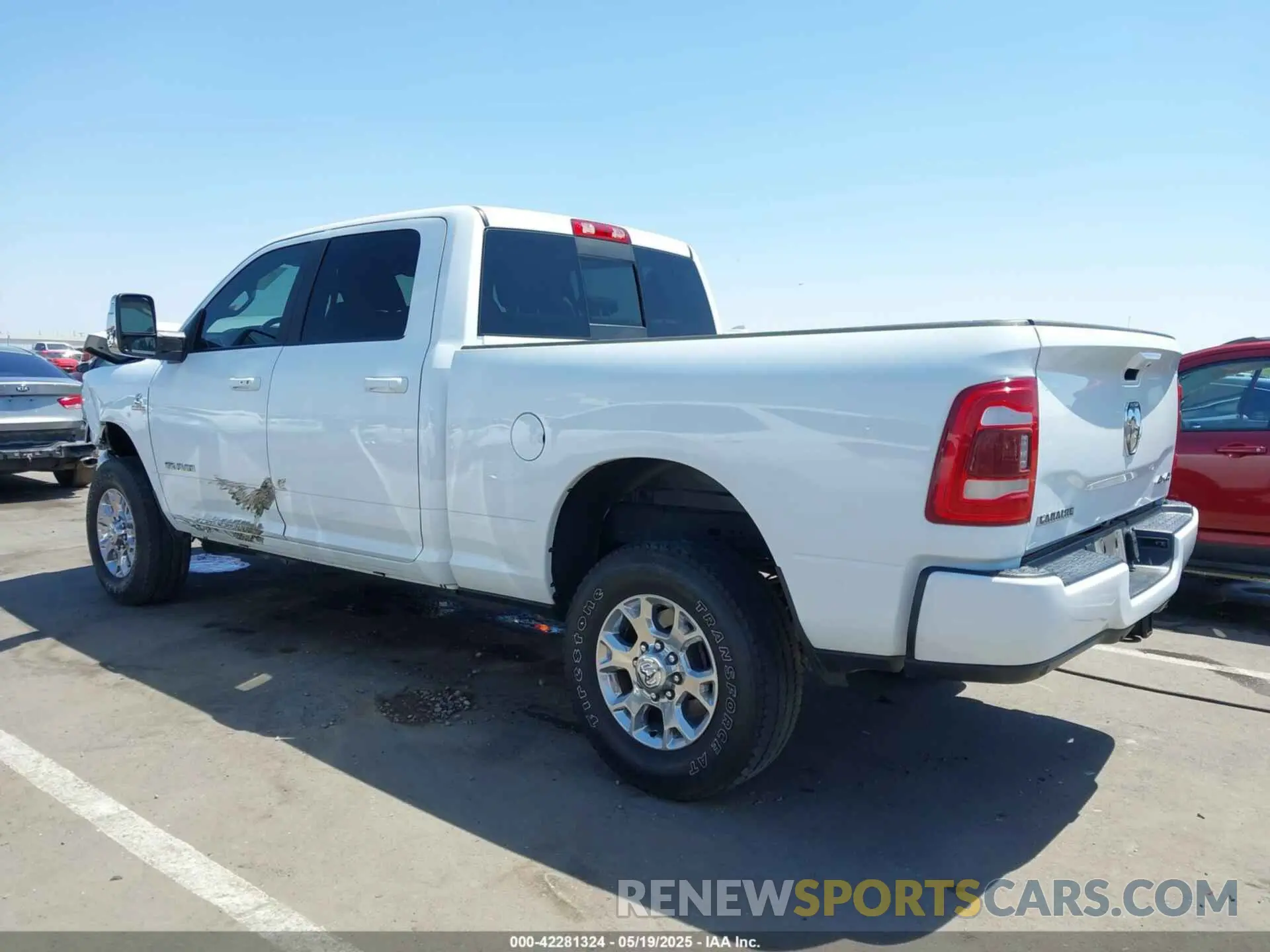3 Photograph of a damaged car 3C6UR5FL2PG559276 RAM 2500 2023