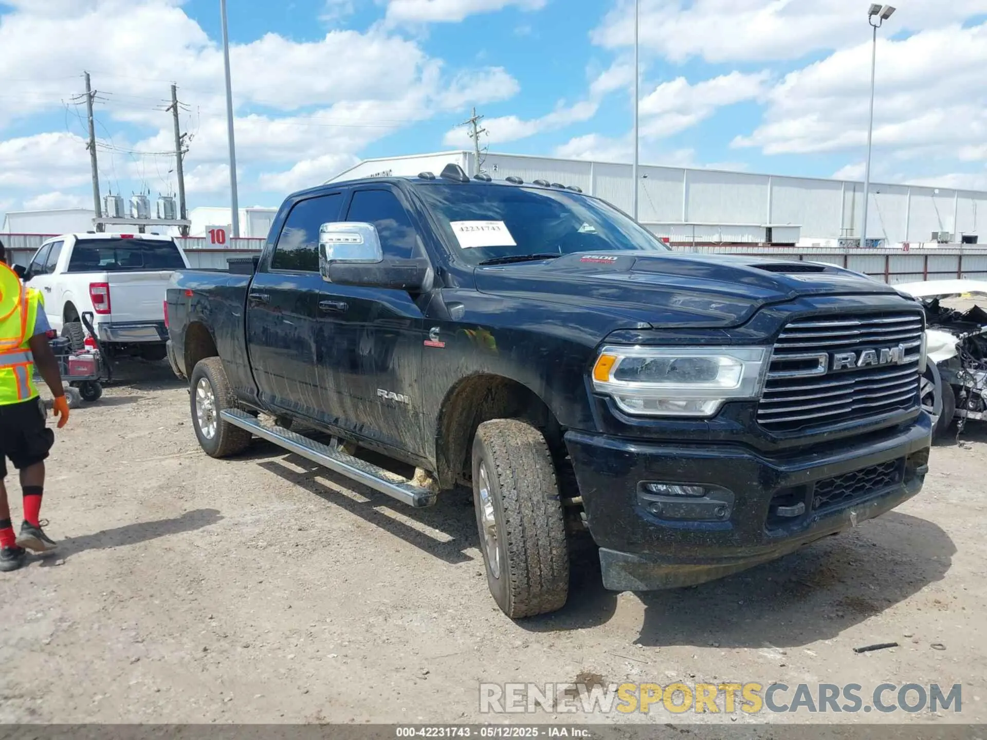 1 Photograph of a damaged car 3C6UR5FL2PG567670 RAM 2500 2023