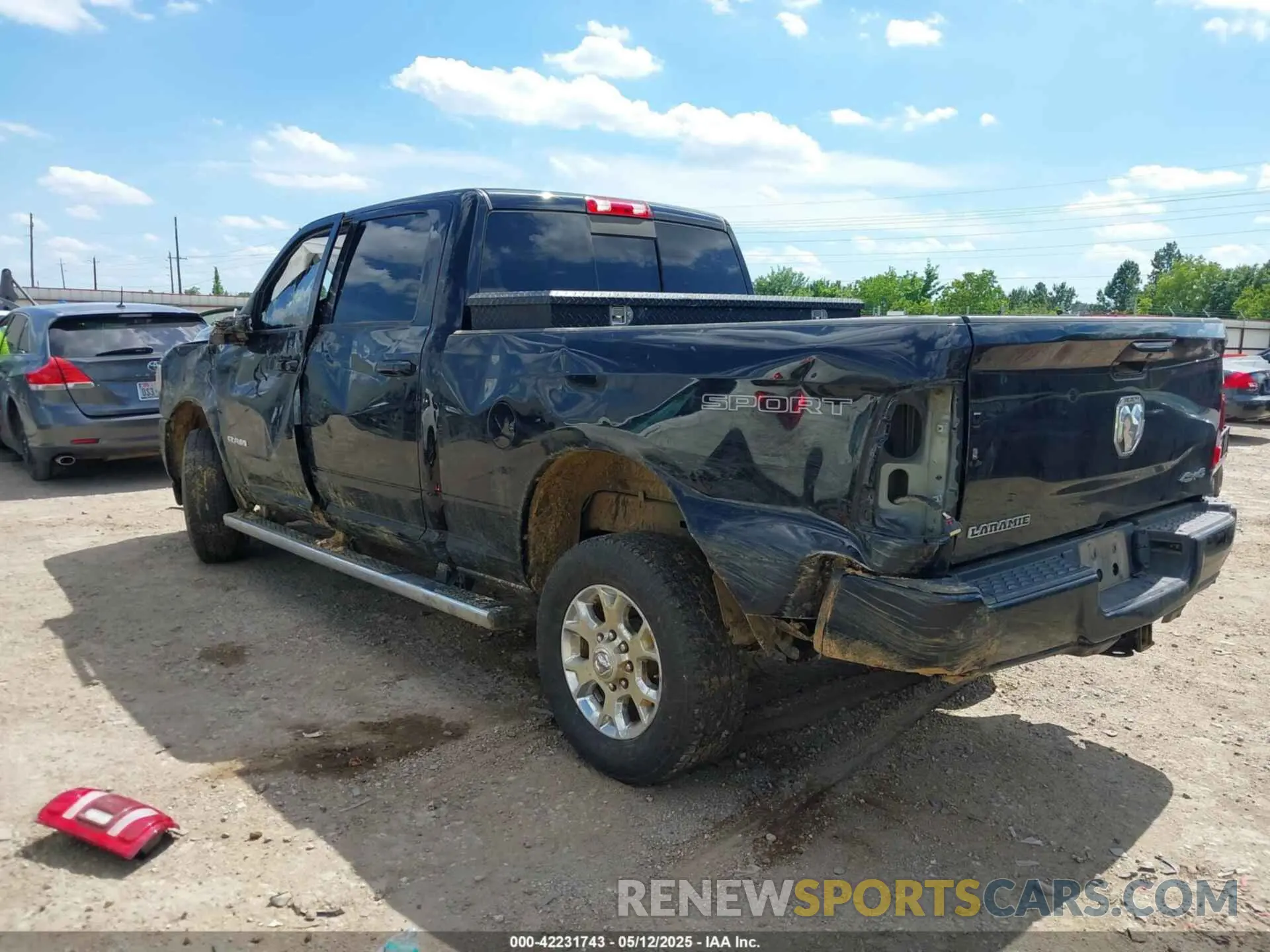 3 Photograph of a damaged car 3C6UR5FL2PG567670 RAM 2500 2023