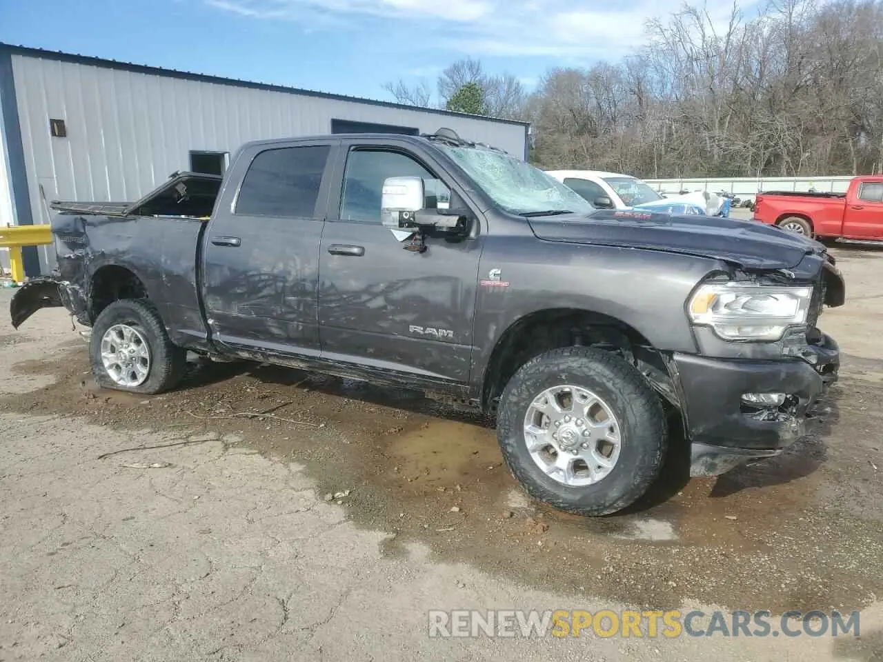 4 Photograph of a damaged car 3C6UR5FL3PG540235 RAM 2500 2023