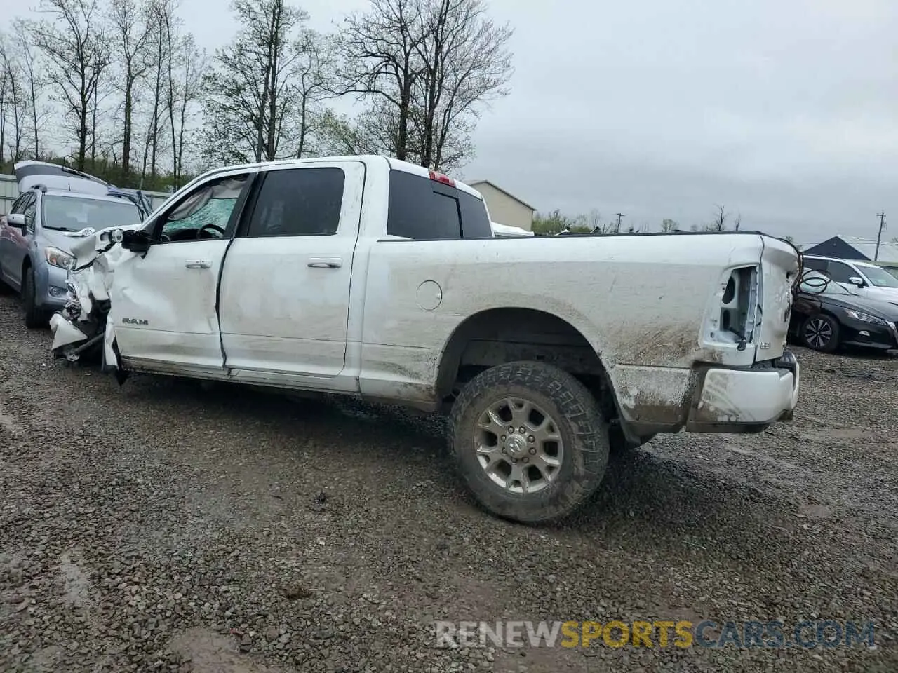 2 Photograph of a damaged car 3C6UR5FL3PG588625 RAM 2500 2023