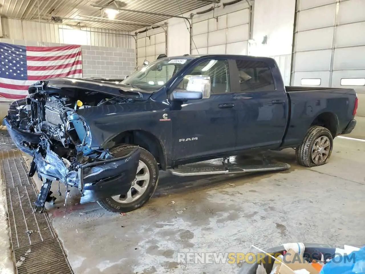 1 Photograph of a damaged car 3C6UR5FL5PG500920 RAM 2500 2023