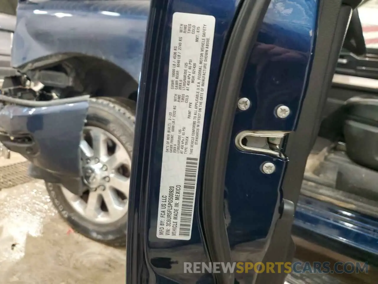 14 Photograph of a damaged car 3C6UR5FL5PG500920 RAM 2500 2023